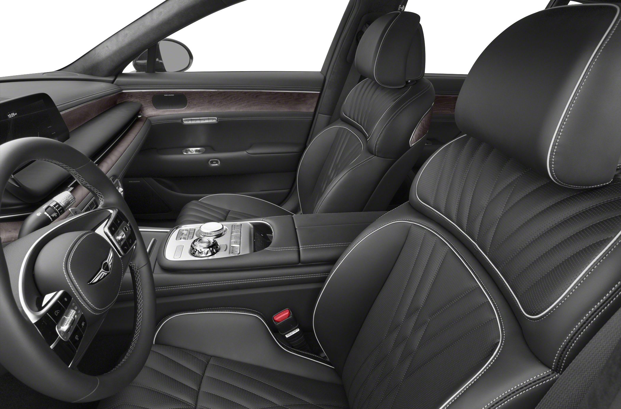 Black leather seats with white stitching and wood trim in luxury car interior