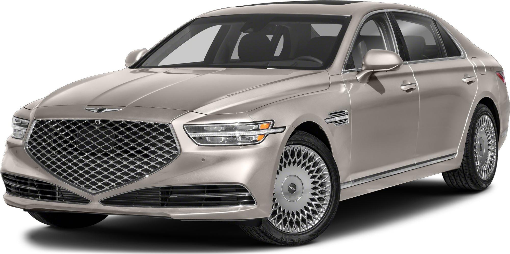 Luxury sedan front with large grille and intricate alloy wheels