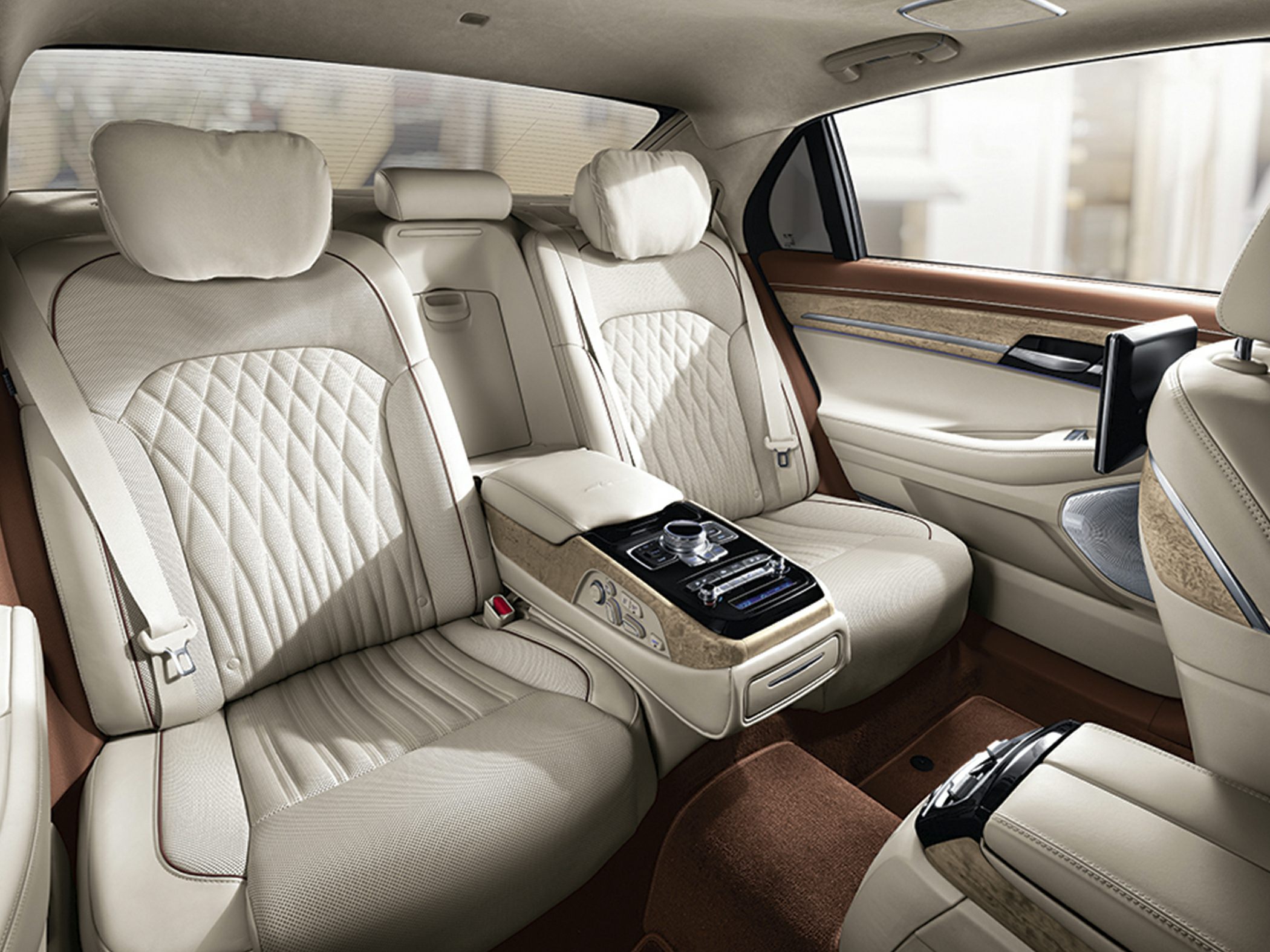 Quilted leather rear seats with center console and wood trim