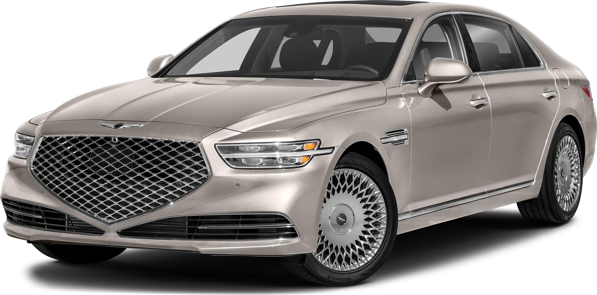 Large diamond-pattern grille and distinctive alloy wheels on sleek luxury sedan