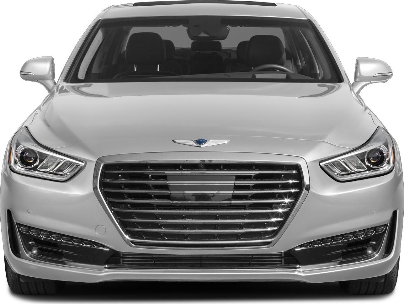 Prominent front grille and multi-element headlights of a luxury sedan