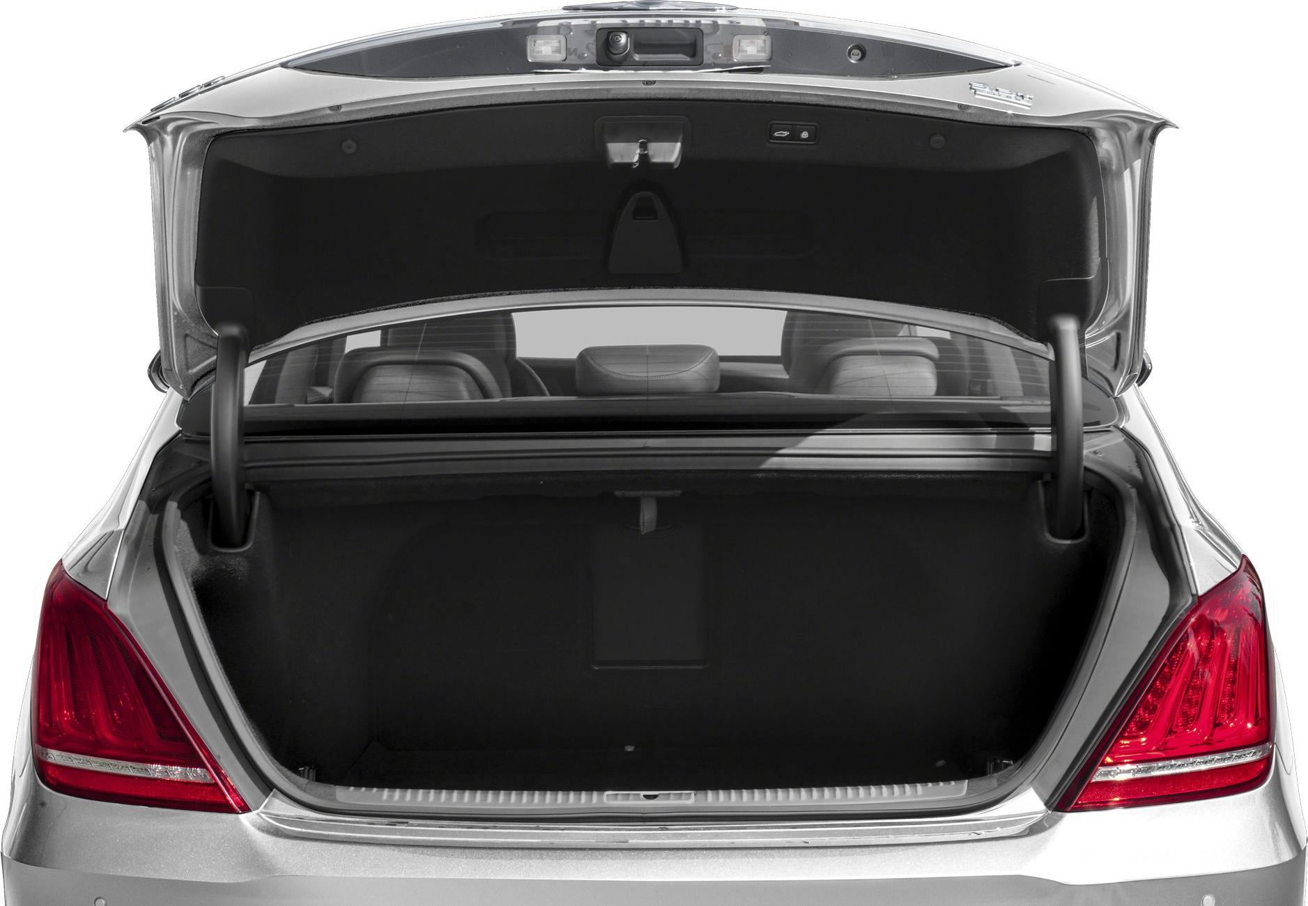 Spacious open trunk and rear interior view of a luxury sedan