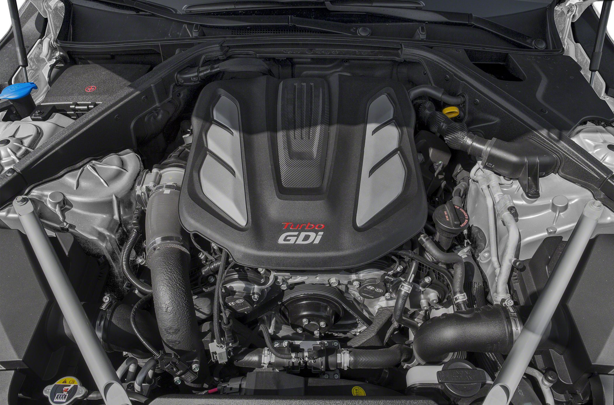 Turbocharged GDi engine with exposed components under the hood