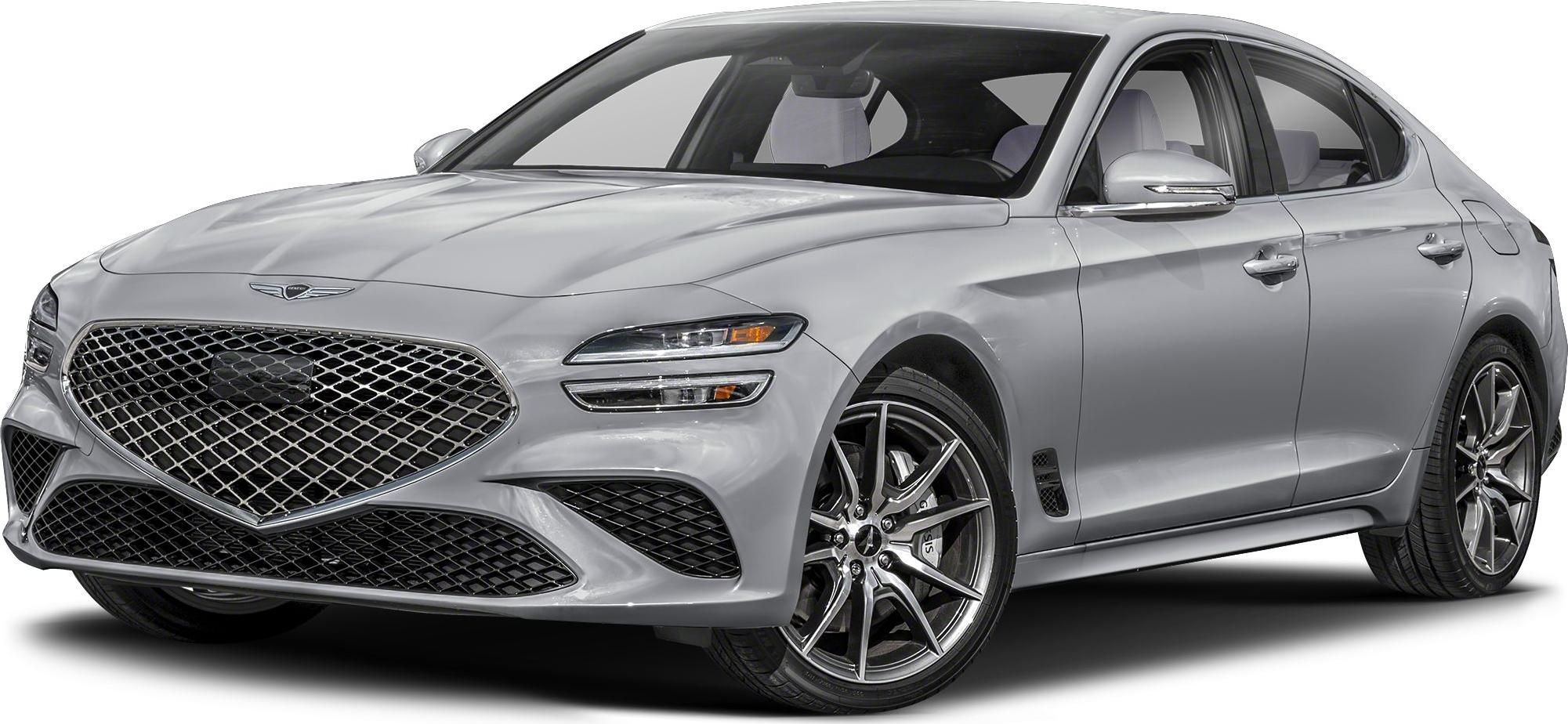 Front view of silver luxury sedan with mesh grille and alloy wheels