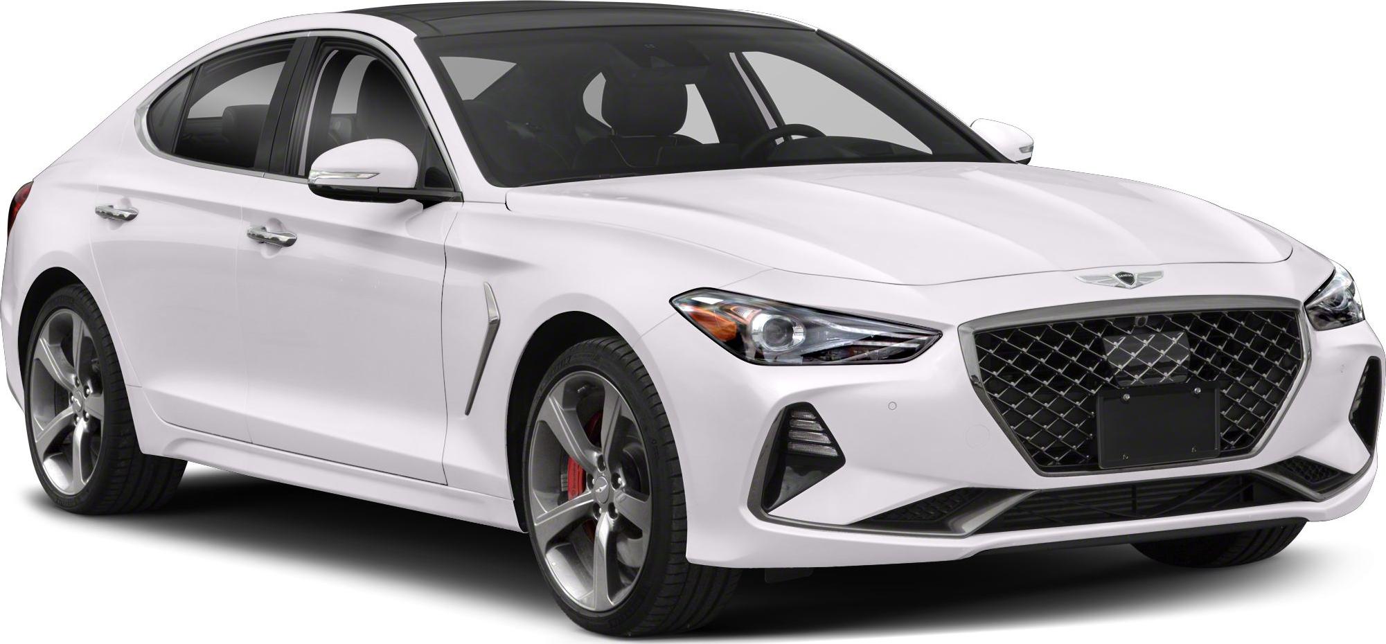 Front angle view of luxury sedan with bold grille and sleek headlights