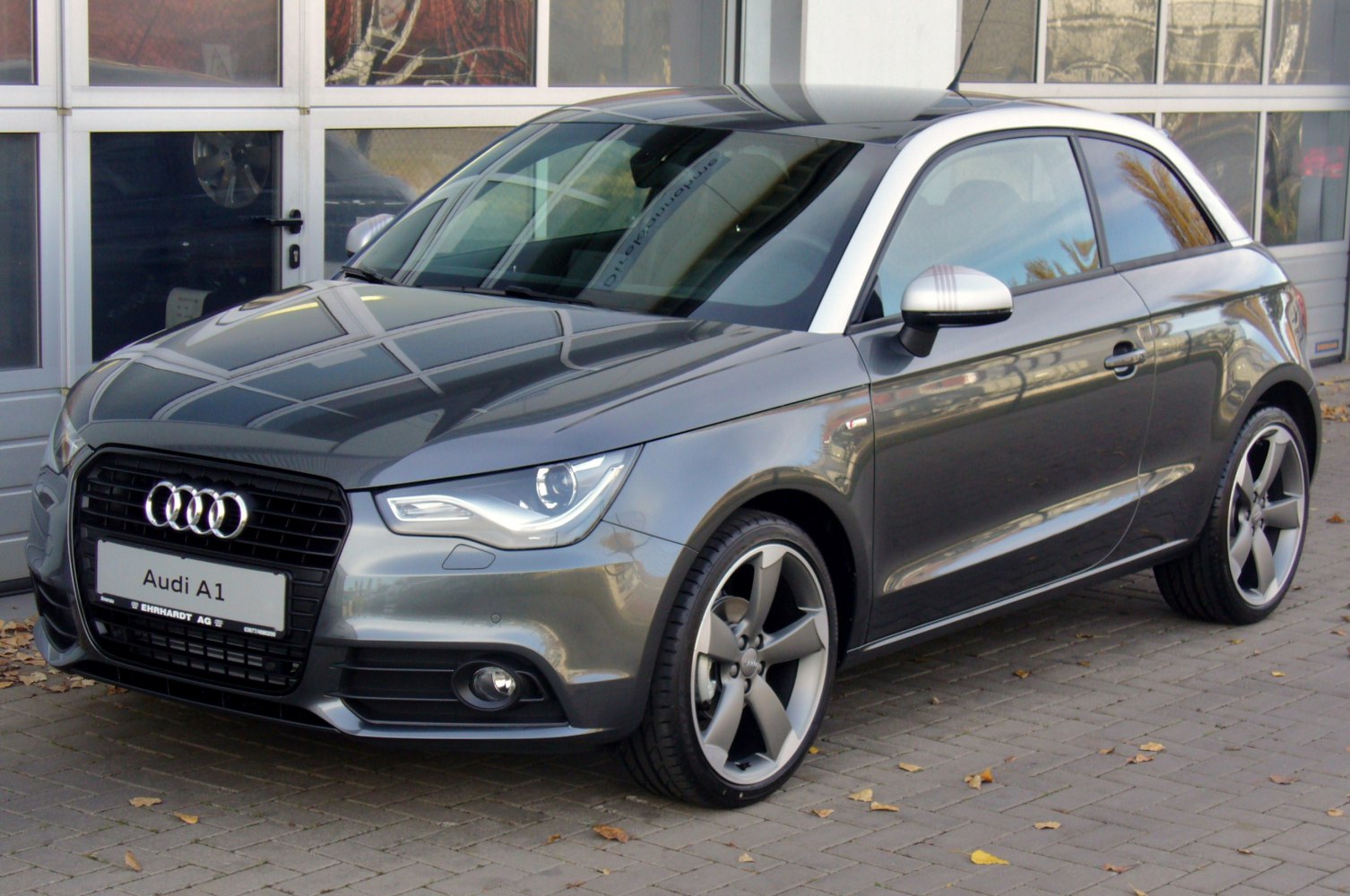Front side view with LED headlights and distinctive alloy wheels