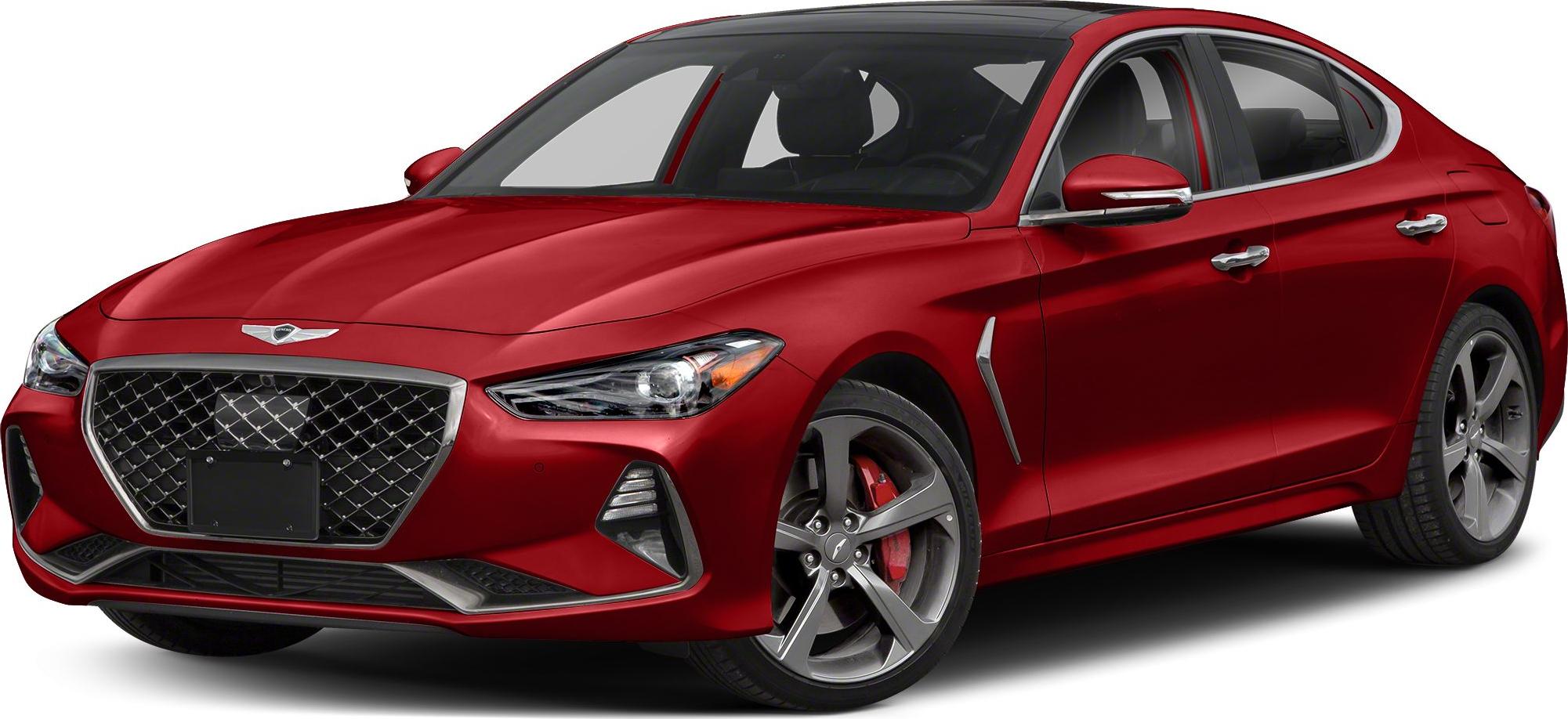 Red luxury sedan with diamond grille and sporty alloy wheels