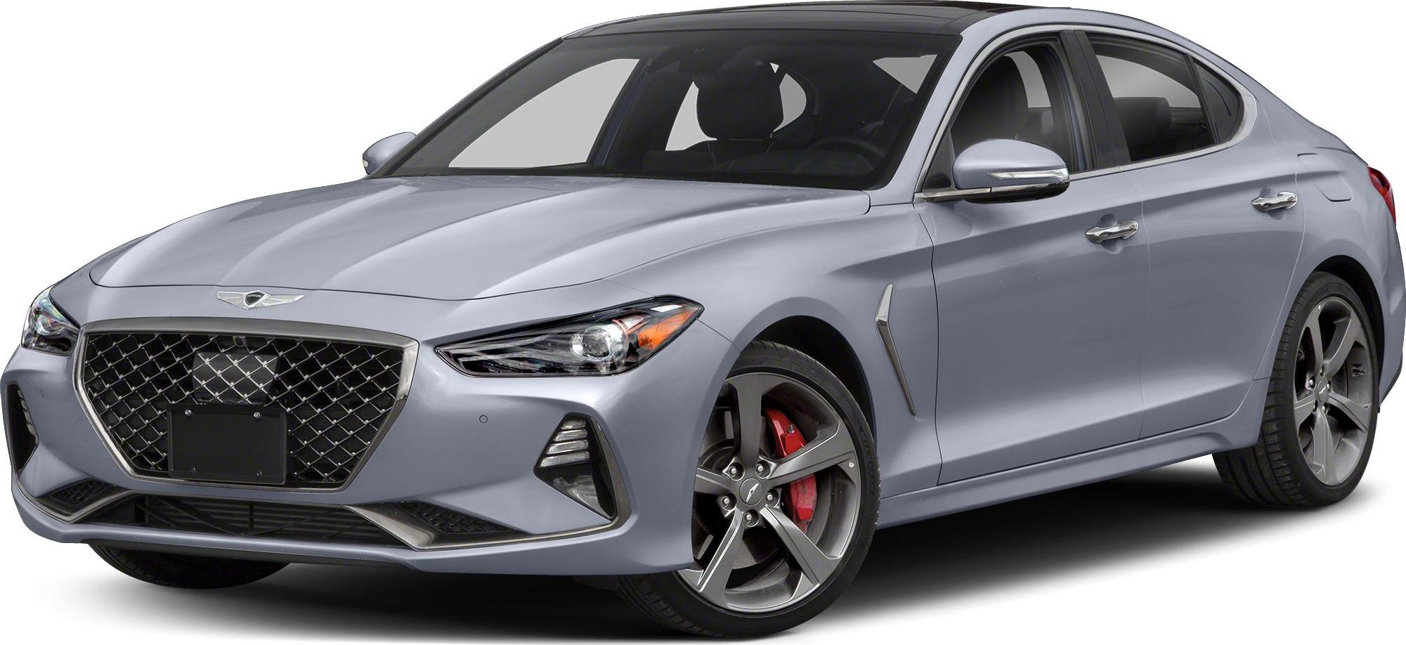 Front angle with diamond-pattern grille and alloy wheels with red brake calipers