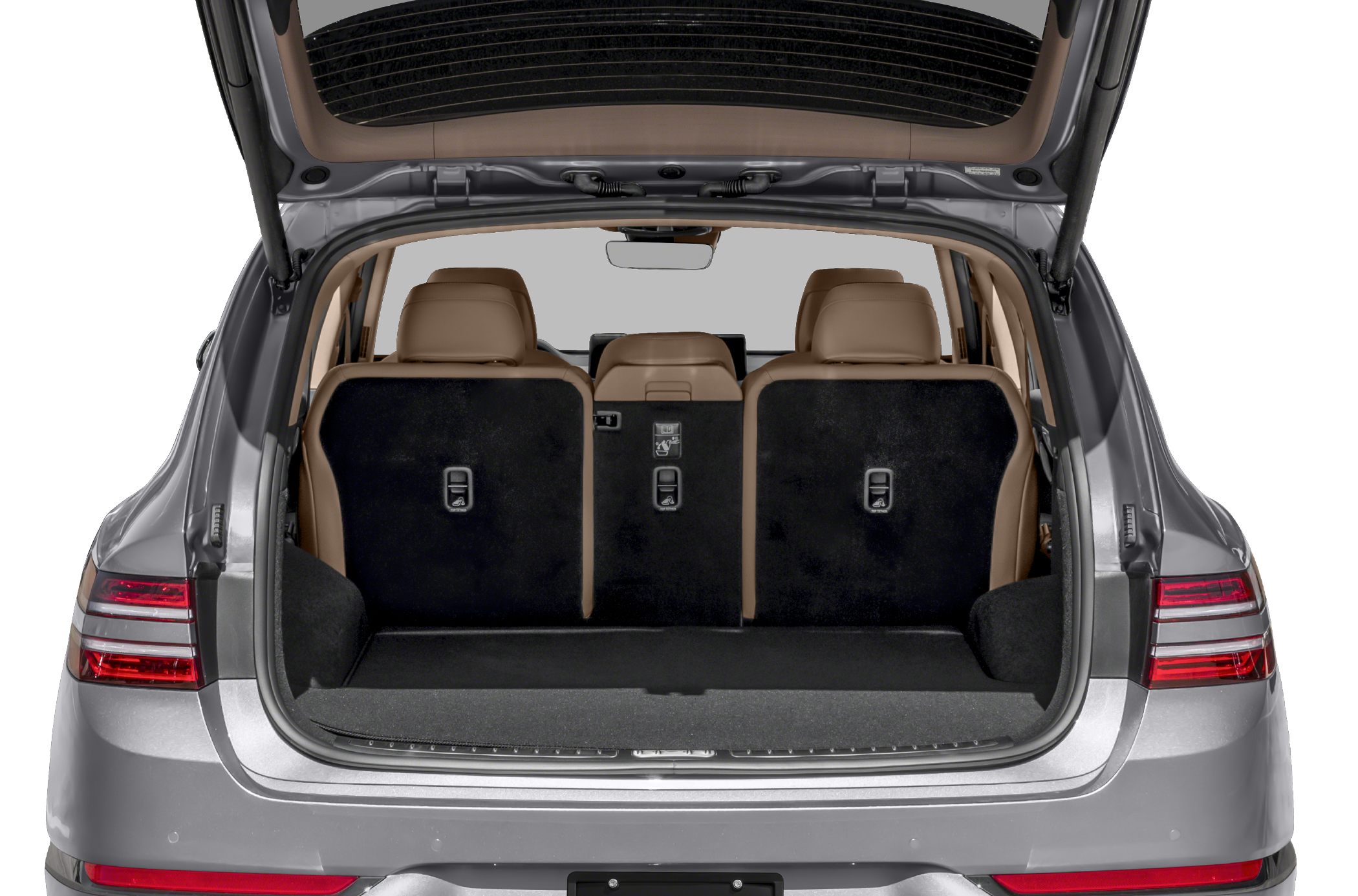 Rear cargo space with folded seats and open hatch