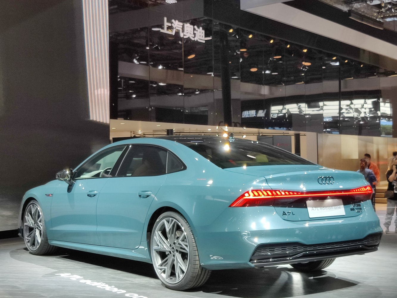 Rear side profile with LED tail light strip and alloy wheels