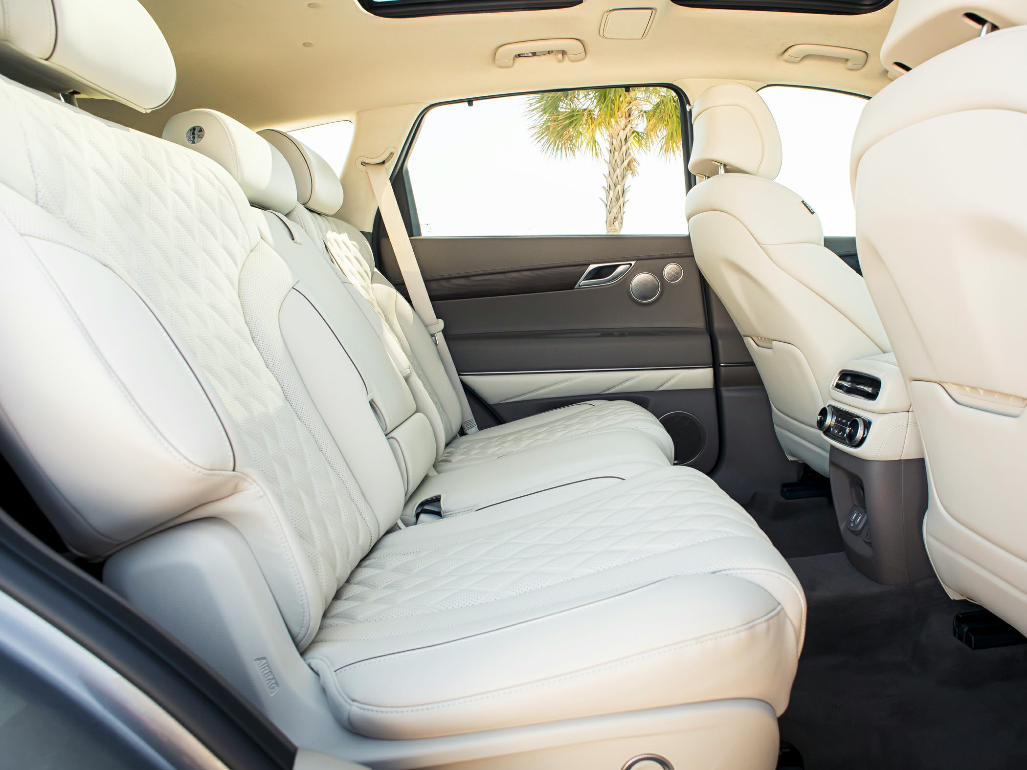 Luxurious quilted leather rear seats with climate controls
