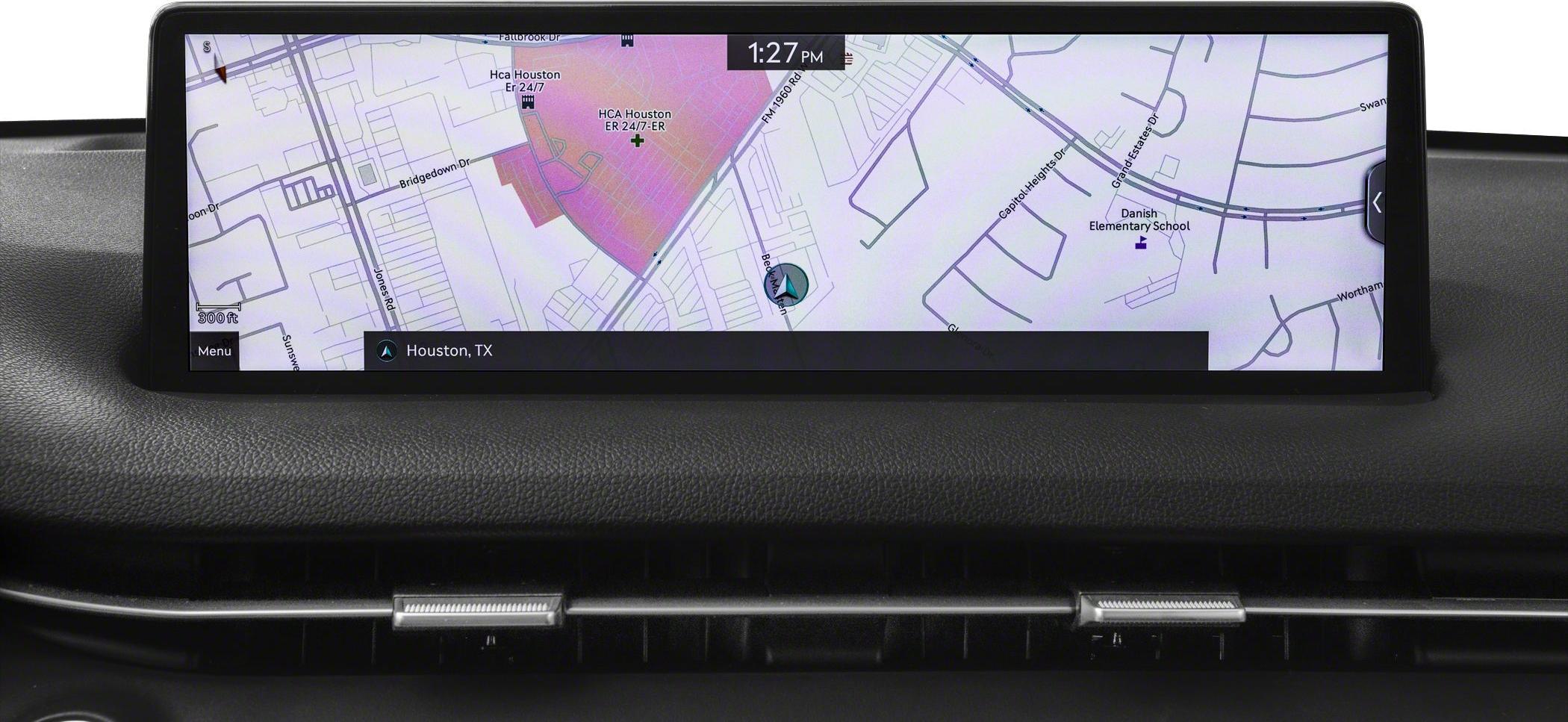 Wide in-car digital navigation display showing detailed Houston TX map.