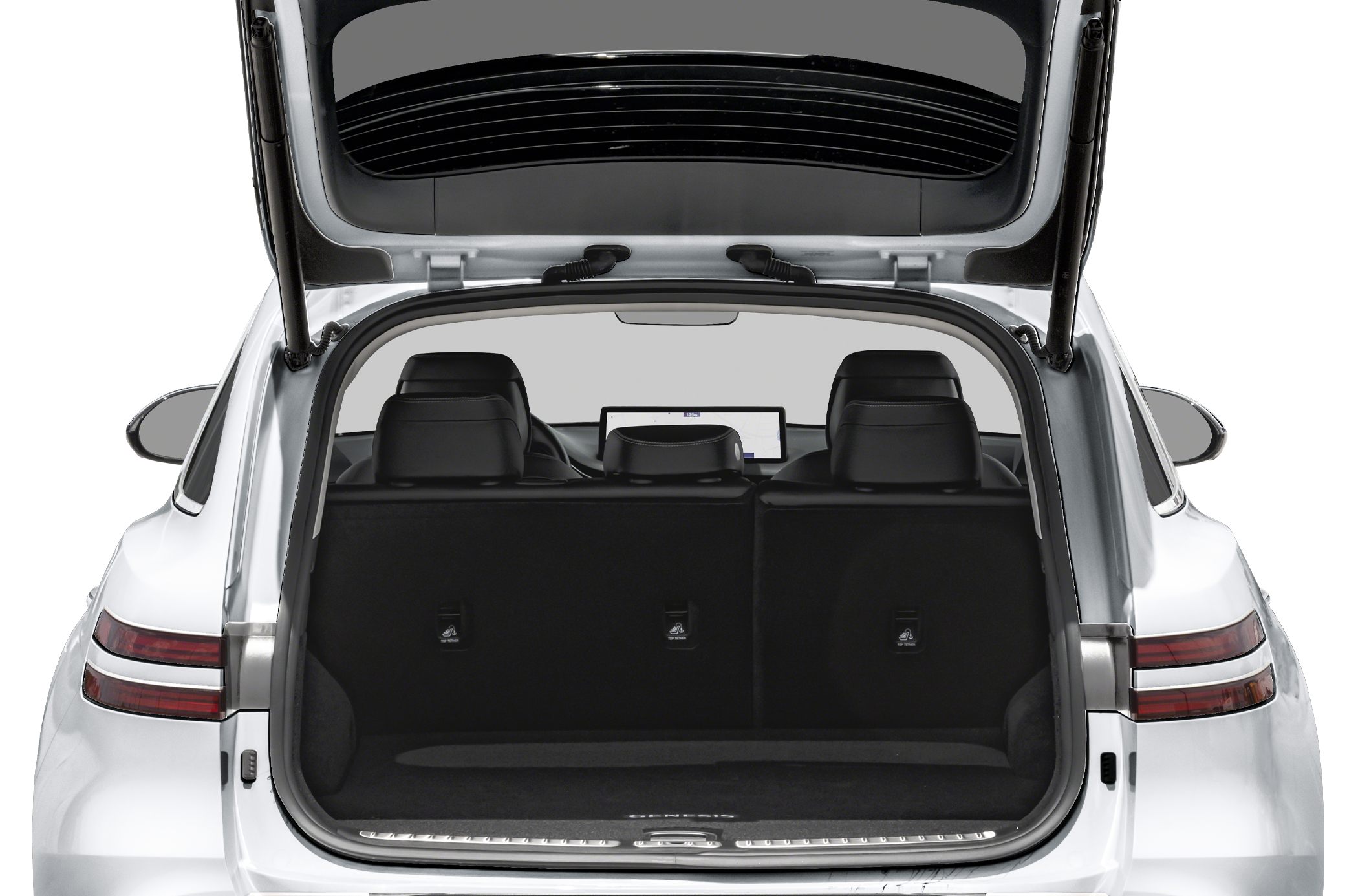 Open tailgate revealing spacious rear cargo area and foldable rear seats.