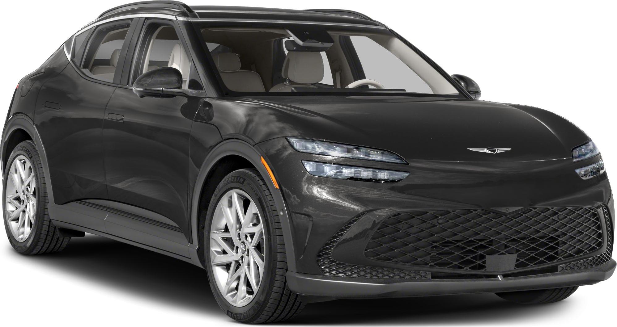 Front view of sleek SUV with double LED headlights and large mesh grille