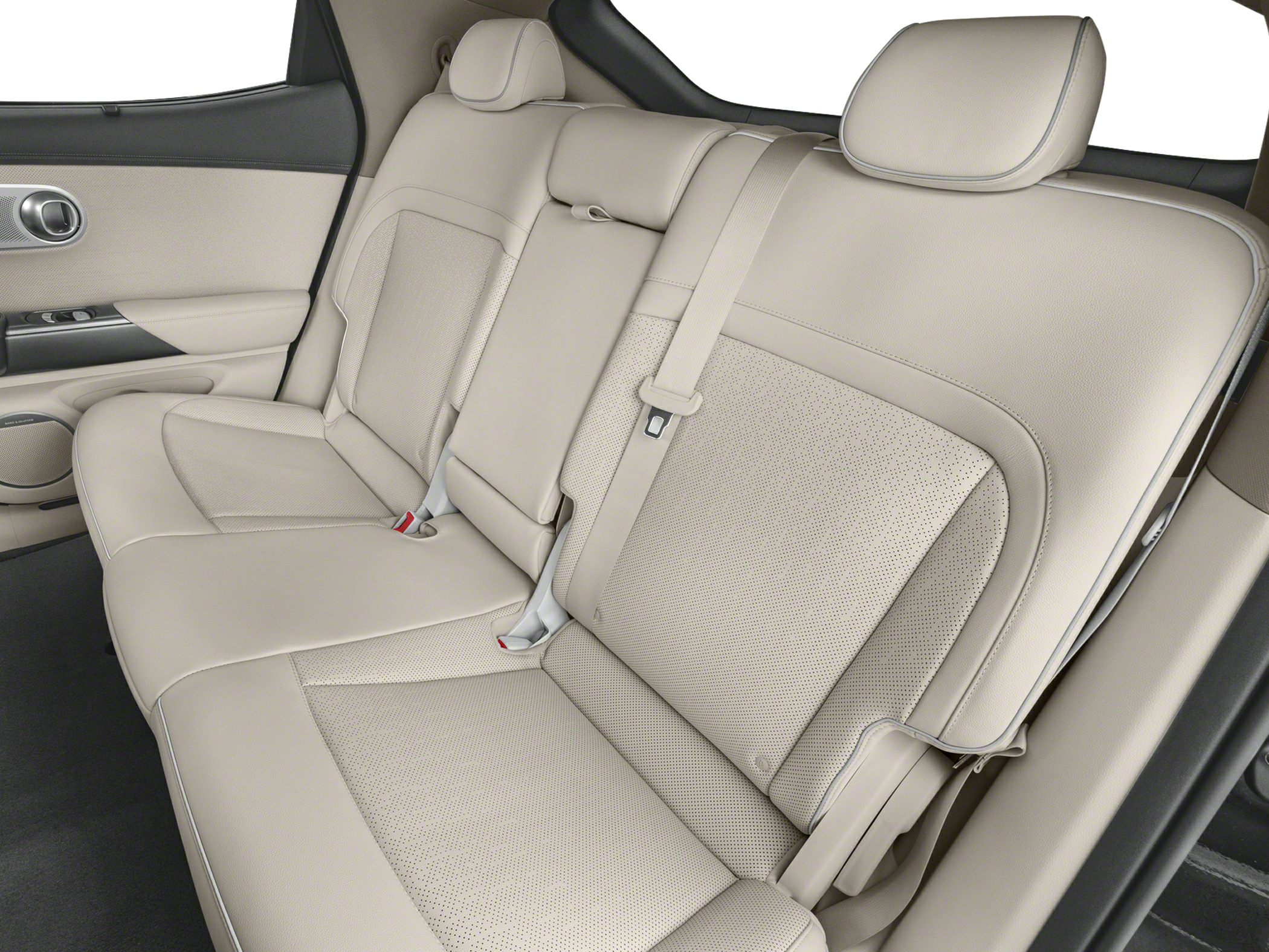 Beige perforated leather rear seats with seatbelts and headrests