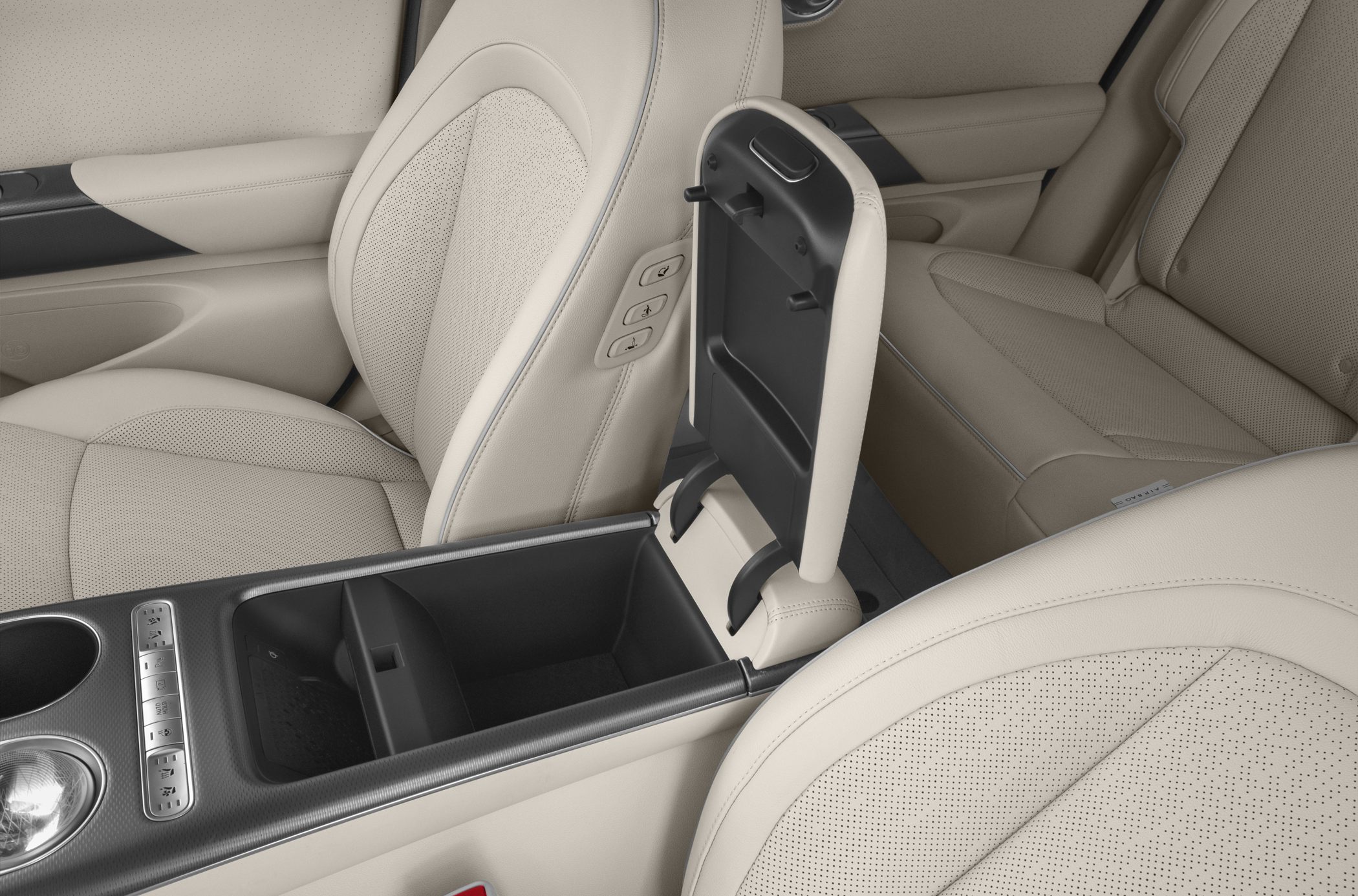 Open center console storage and beige perforated leather seats