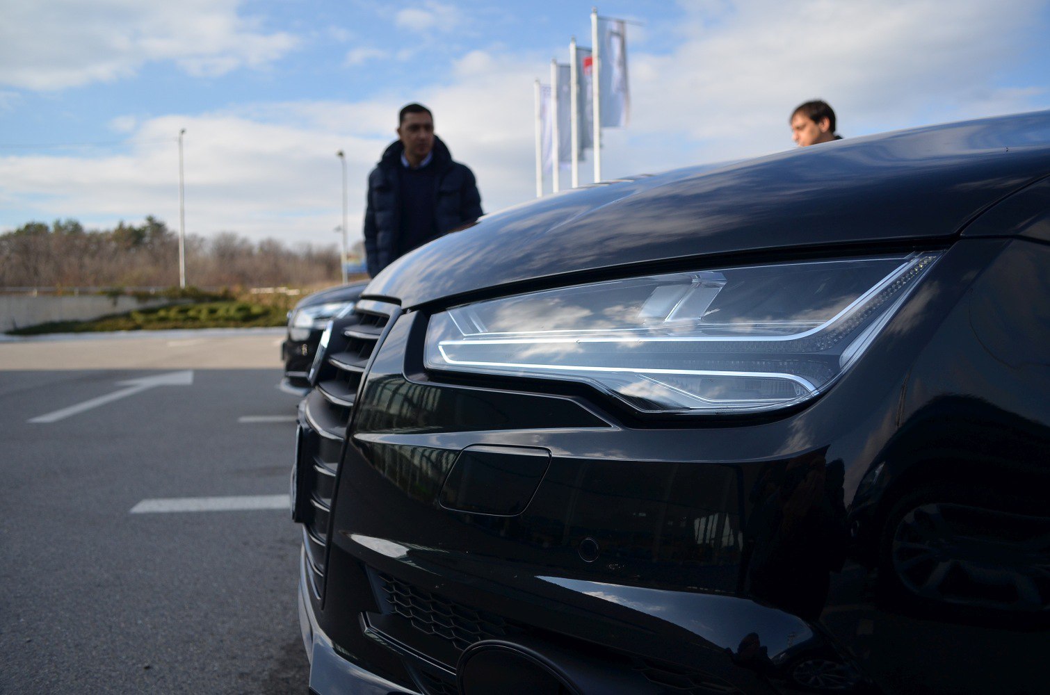 Close-up of modern LED headlights and front grille design