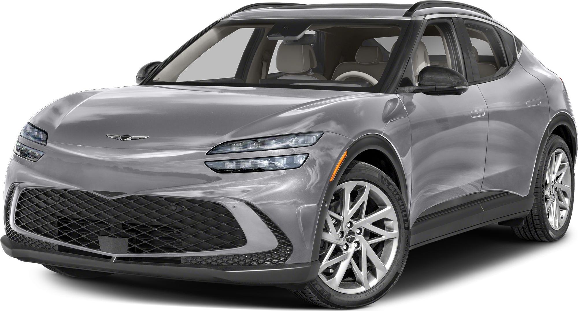 Front view of electric SUV with split LED headlights and large front grille