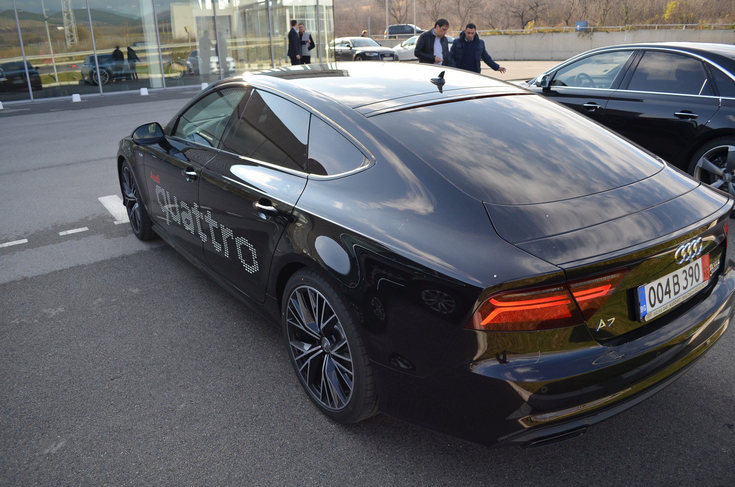 Rear and side view of luxury hatchback with Quattro badge