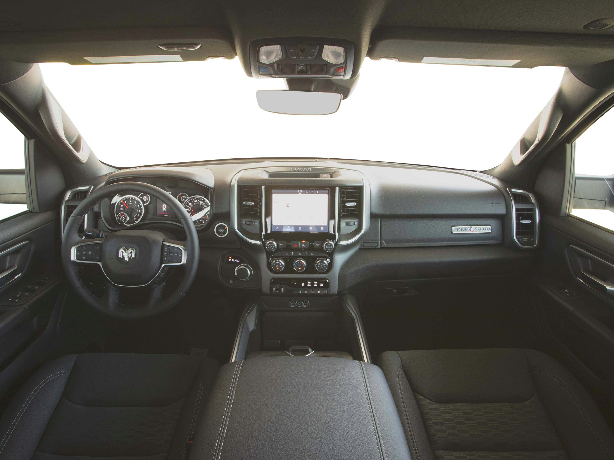 Modern truck interior with touchscreen and multifunction steering wheel