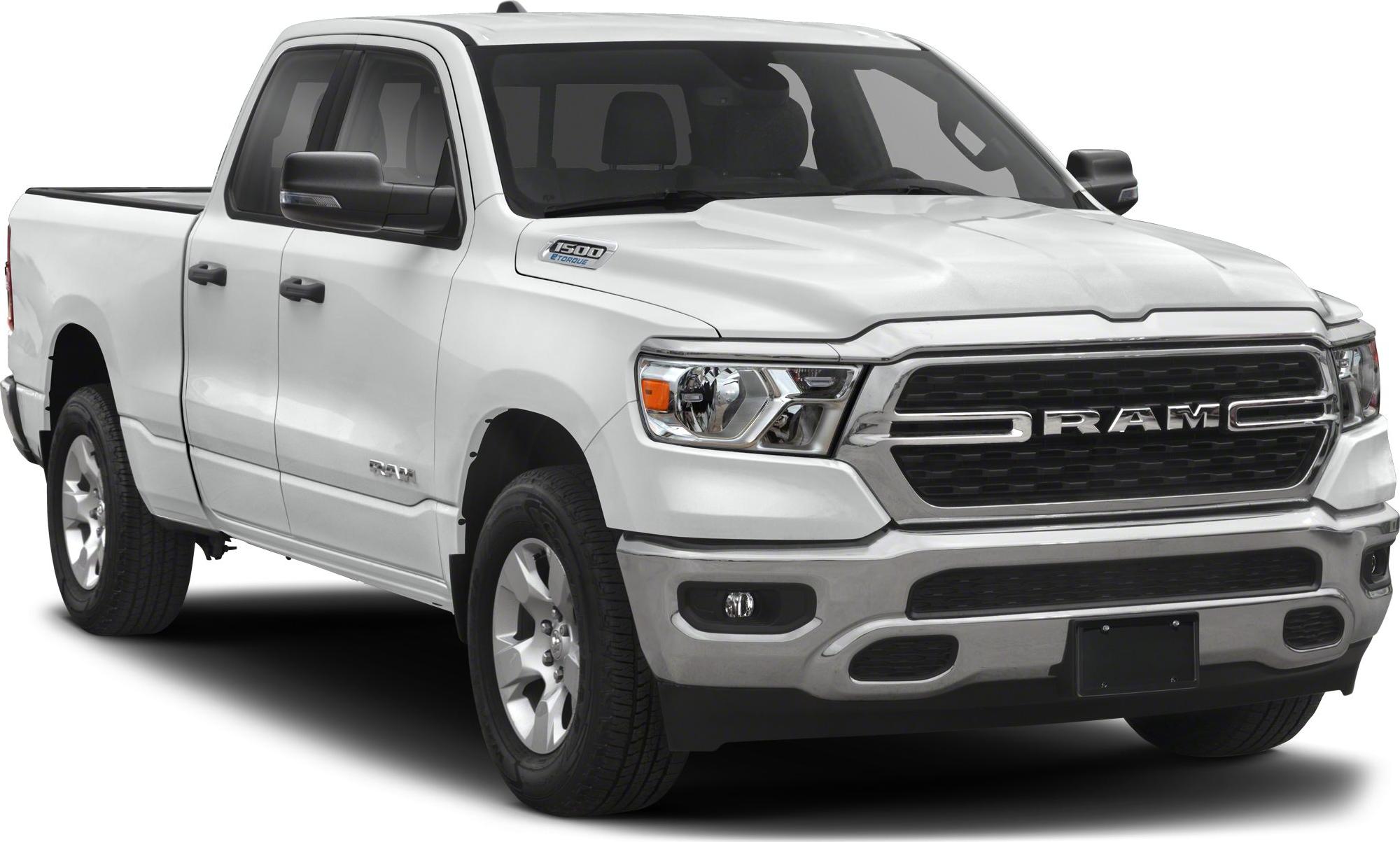 Front-side view of pickup with bold grille and quad cab doors.