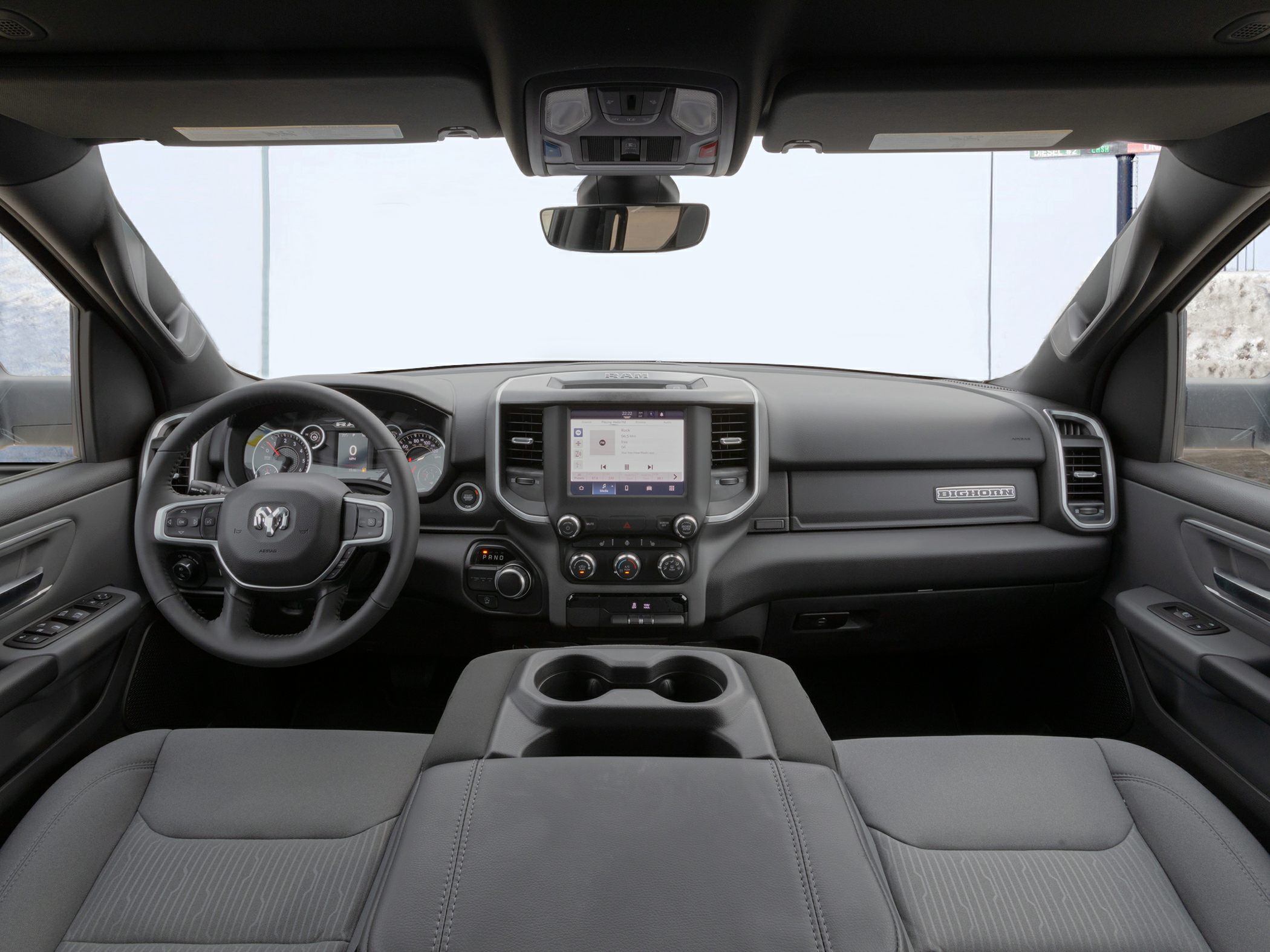 Interior dashboard and steering wheel with touchscreen and digital instruments