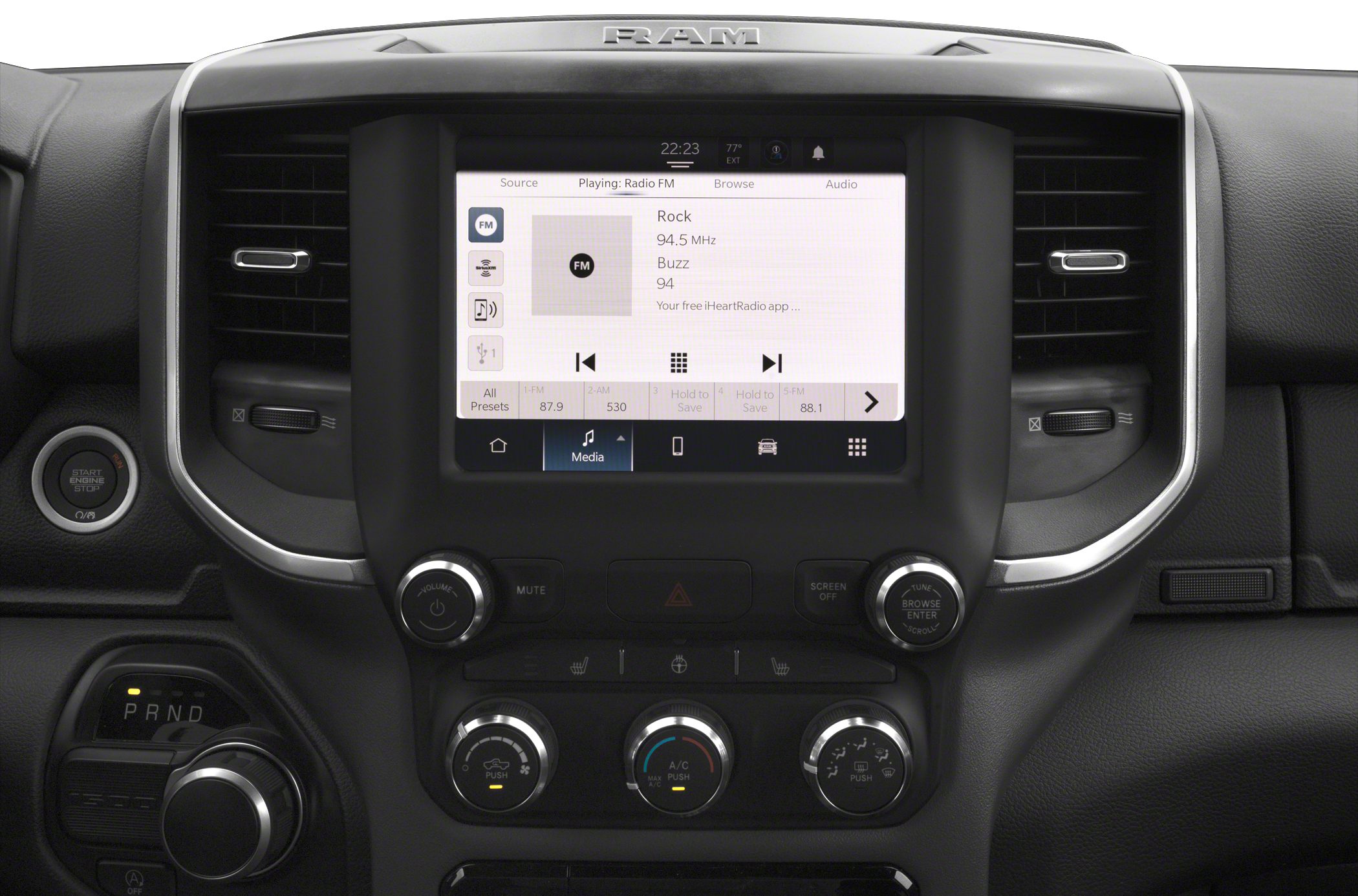 Center touchscreen, media controls, climate control knobs on dashboard