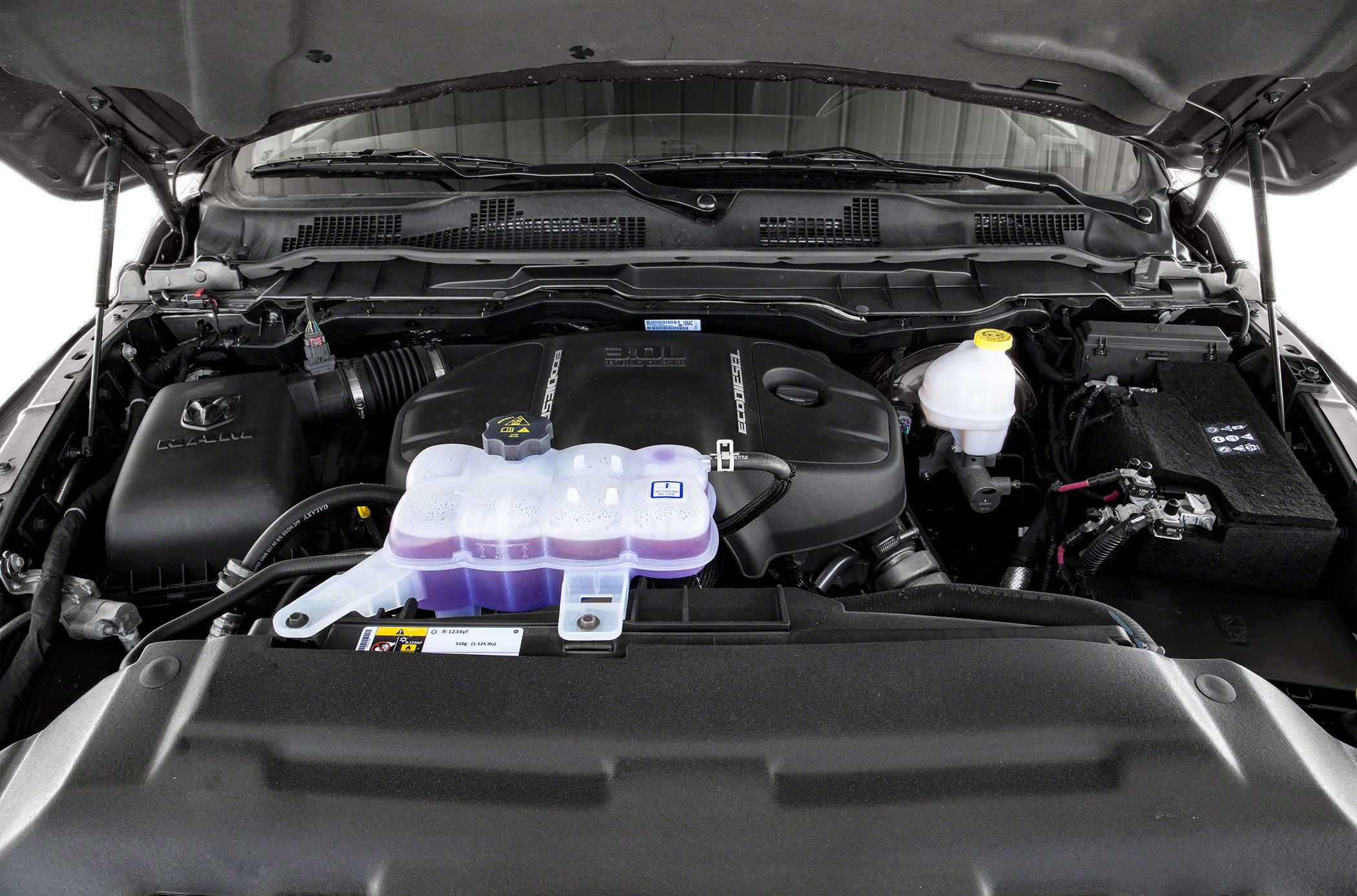 3.0L EcoDiesel engine compartment with fluid reservoirs and engine cover
