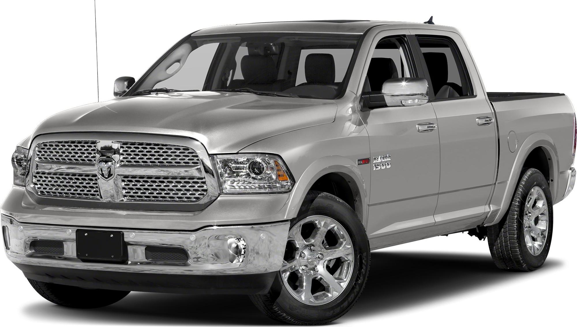 Chrome grille and alloy wheels visible on pickup truck front-side view