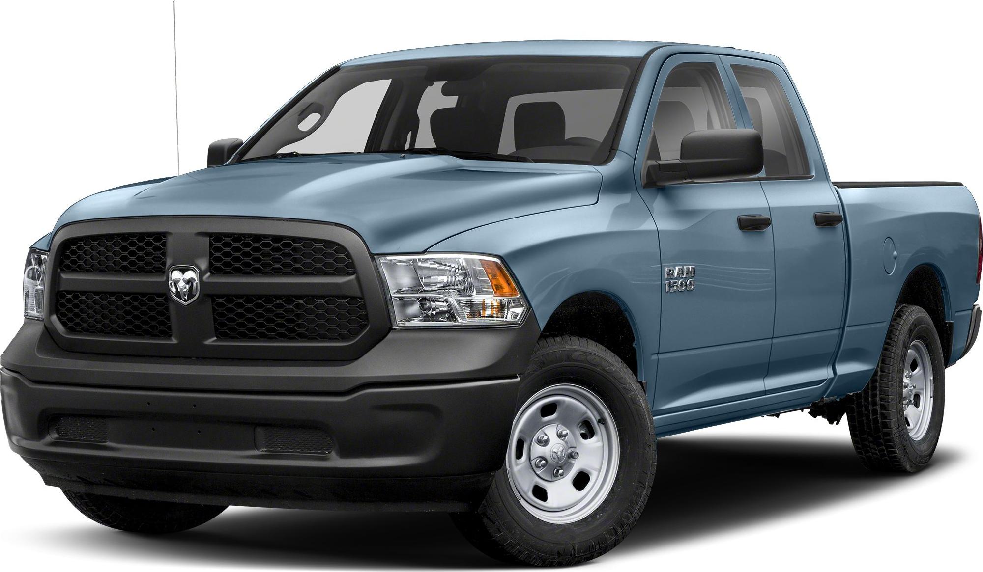 Front view of Quad Cab truck with black honeycomb grille and steel wheels