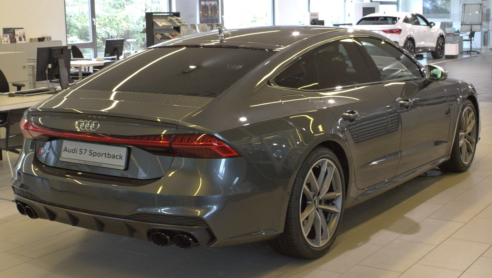 Rear view with sleek taillights and quad exhausts
