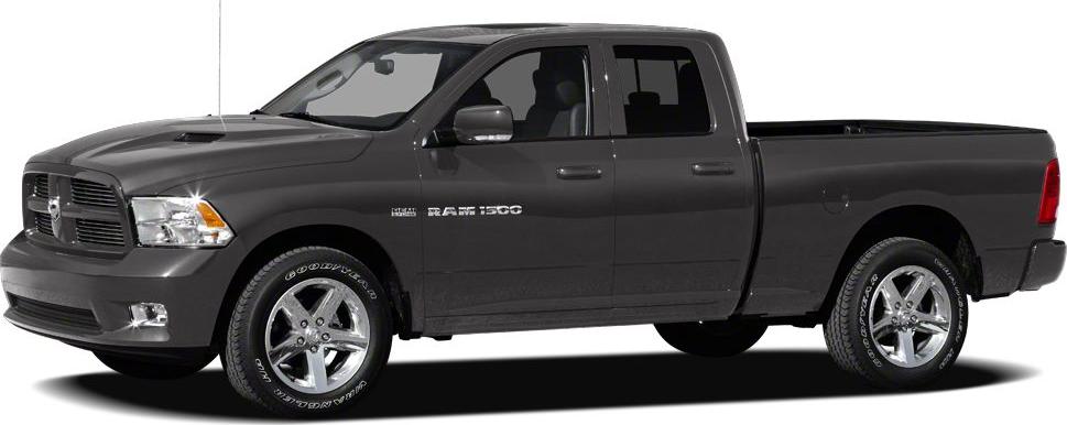 Side view of black pickup truck with Quad Cab and V8 HEMI badge