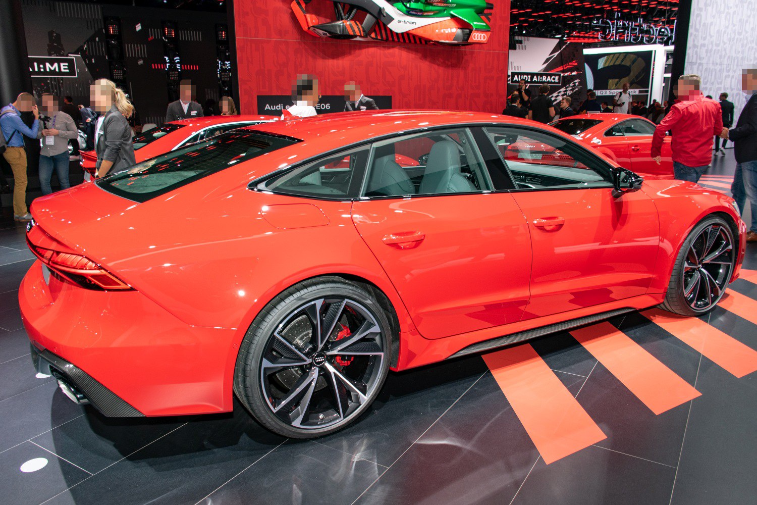 Rear side view with black alloy wheels and red brake calipers