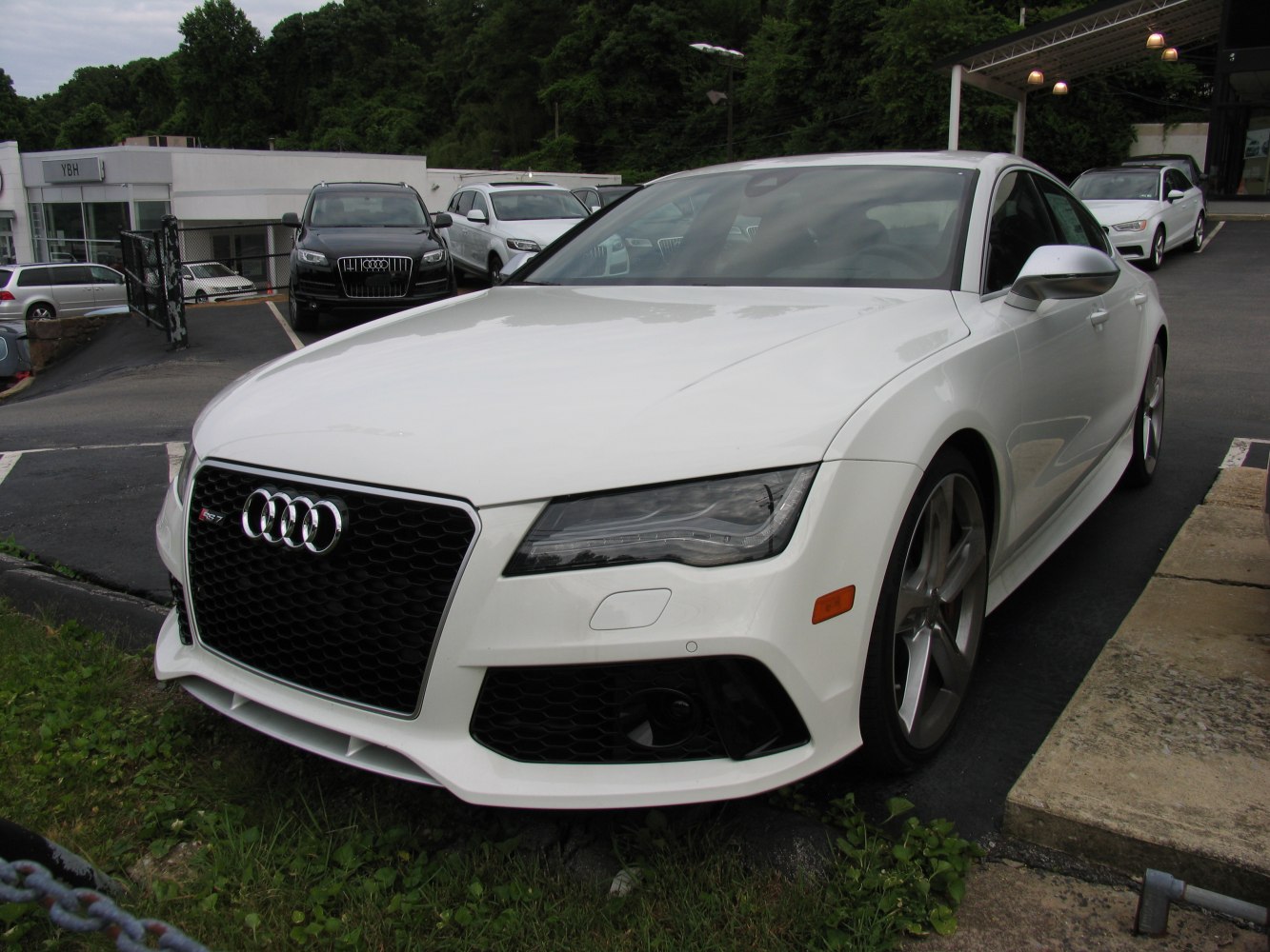 Front view with honeycomb grille and sleek LED headlights