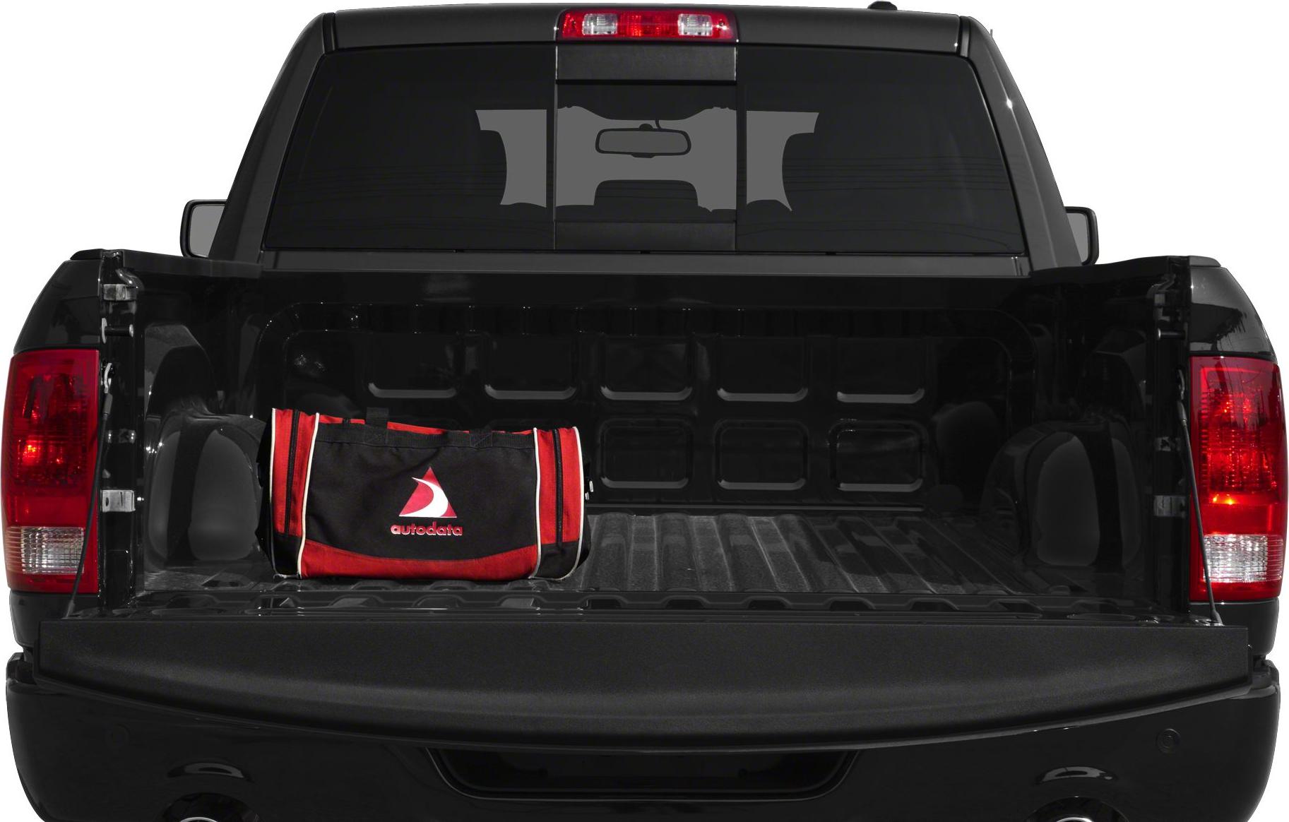 Open pickup truck bed with black and red tool bag inside