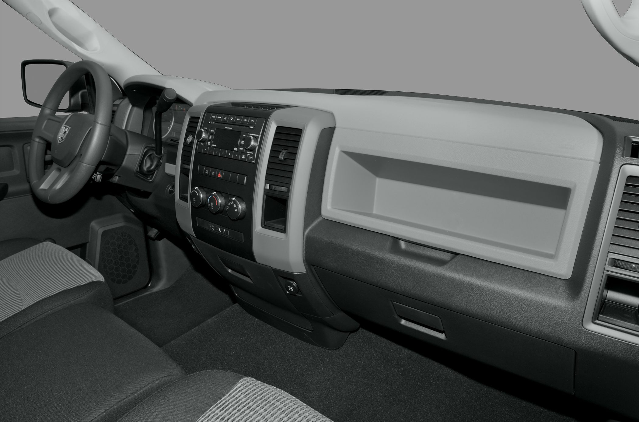 Dashboard and steering wheel with manual gear shift and climate controls