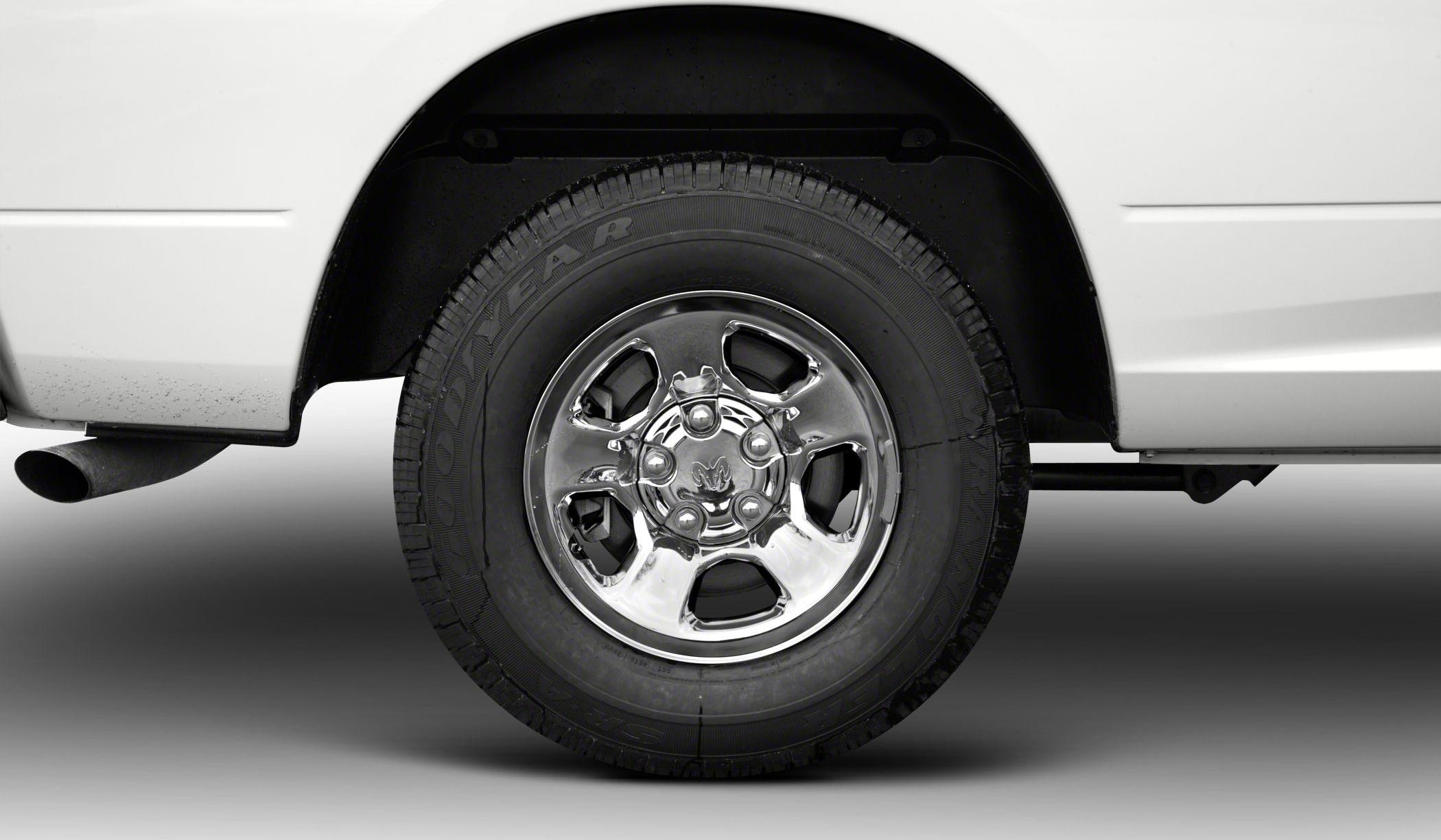 Chrome wheel and Goodyear tire close-up on truck rear side