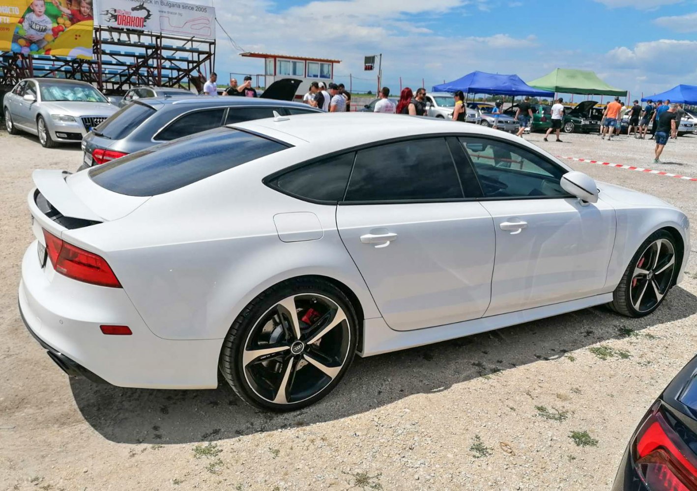 White 2013 sportback with tinted windows and alloy wheels