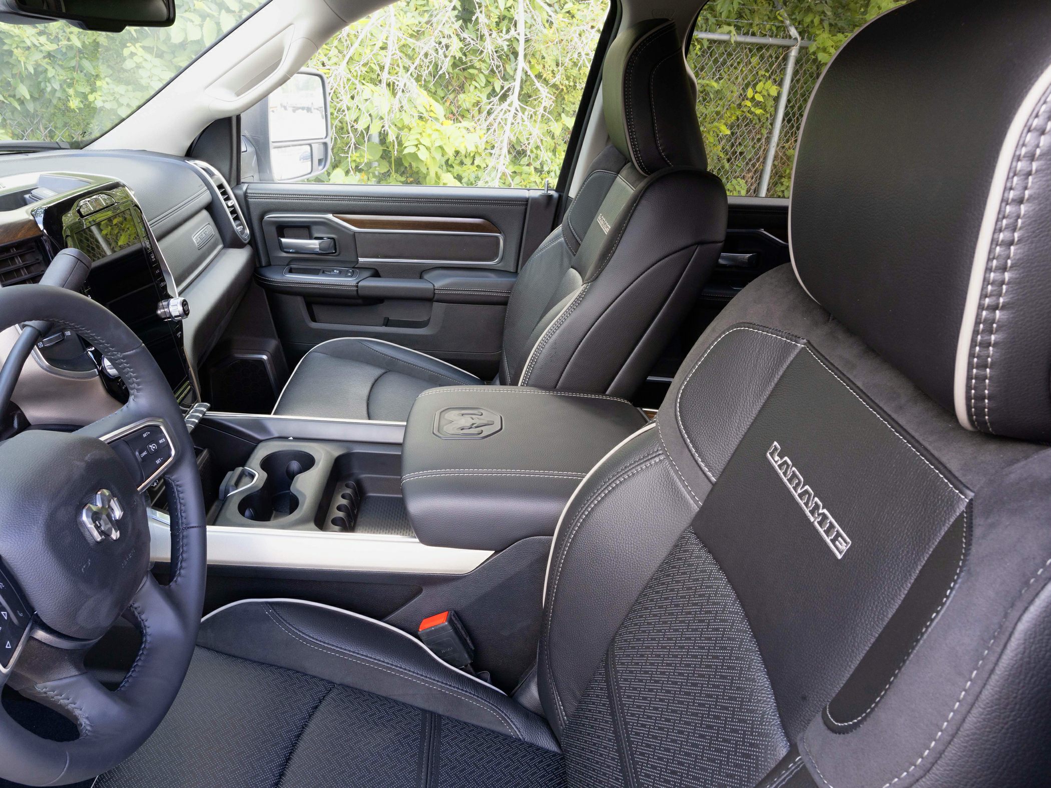 Premium black leather seats and detailed interior with modern dashboard.