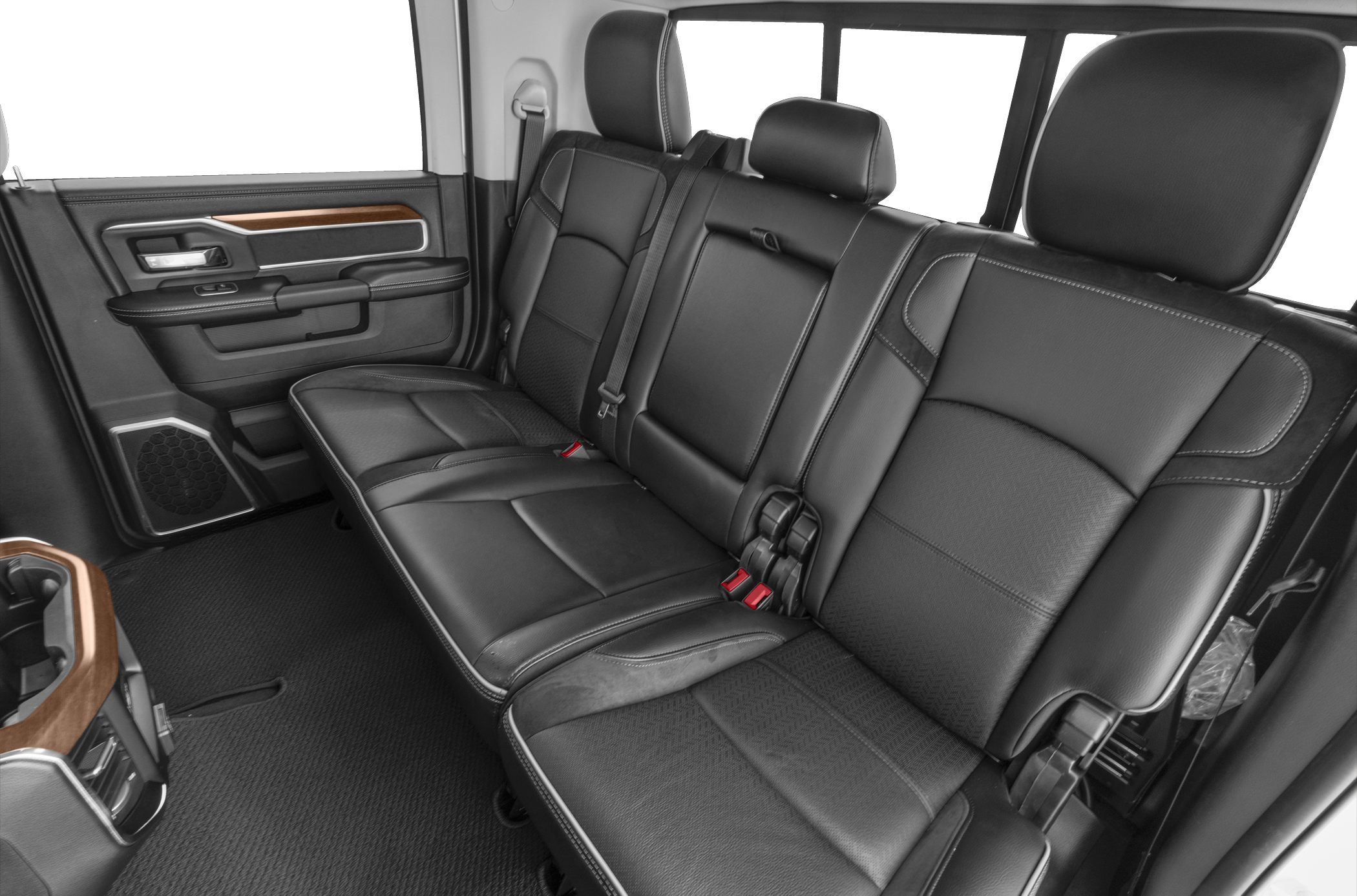 Black leather rear seat with detailed stitching and spacious layout