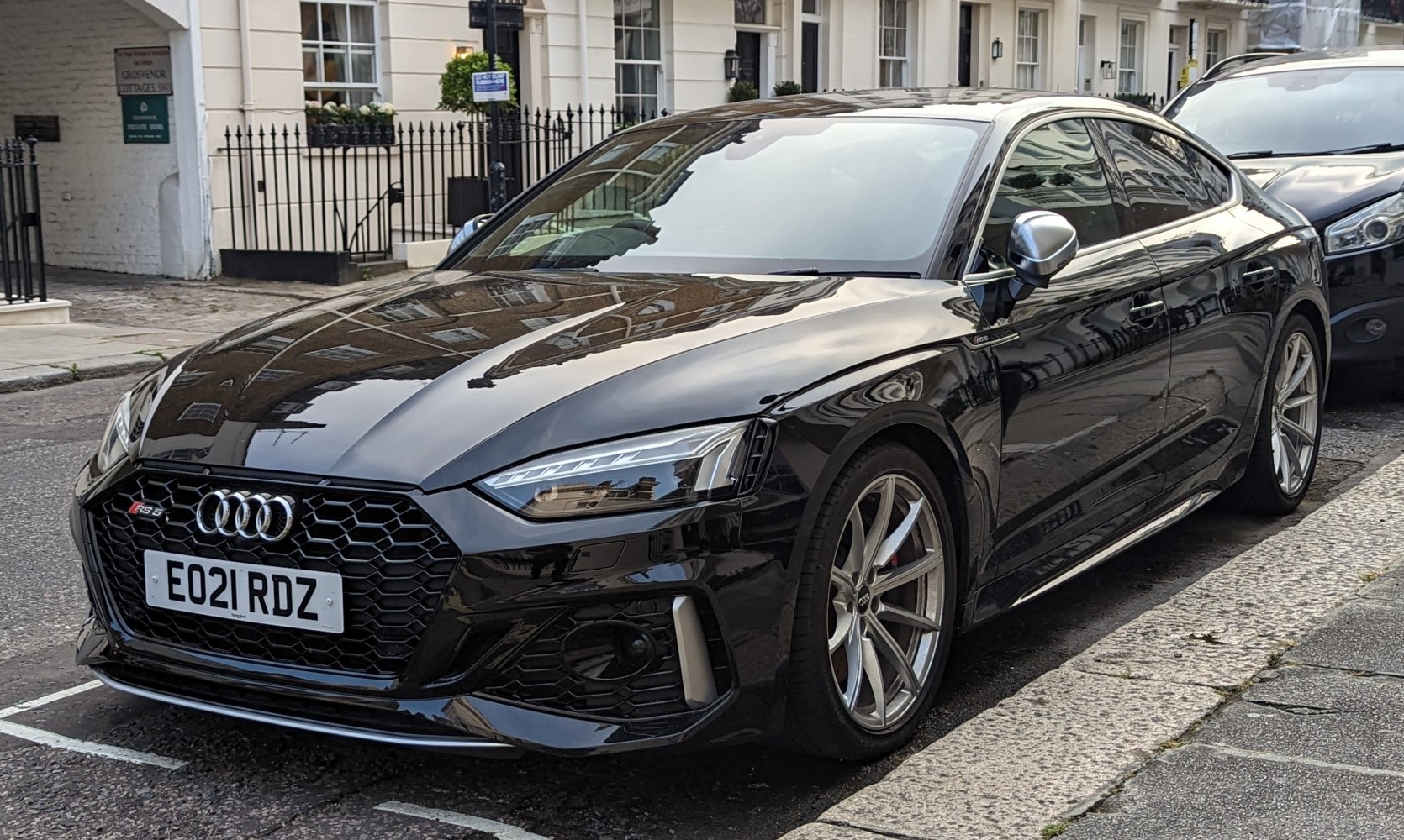 Front view with LED headlights and honeycomb grille