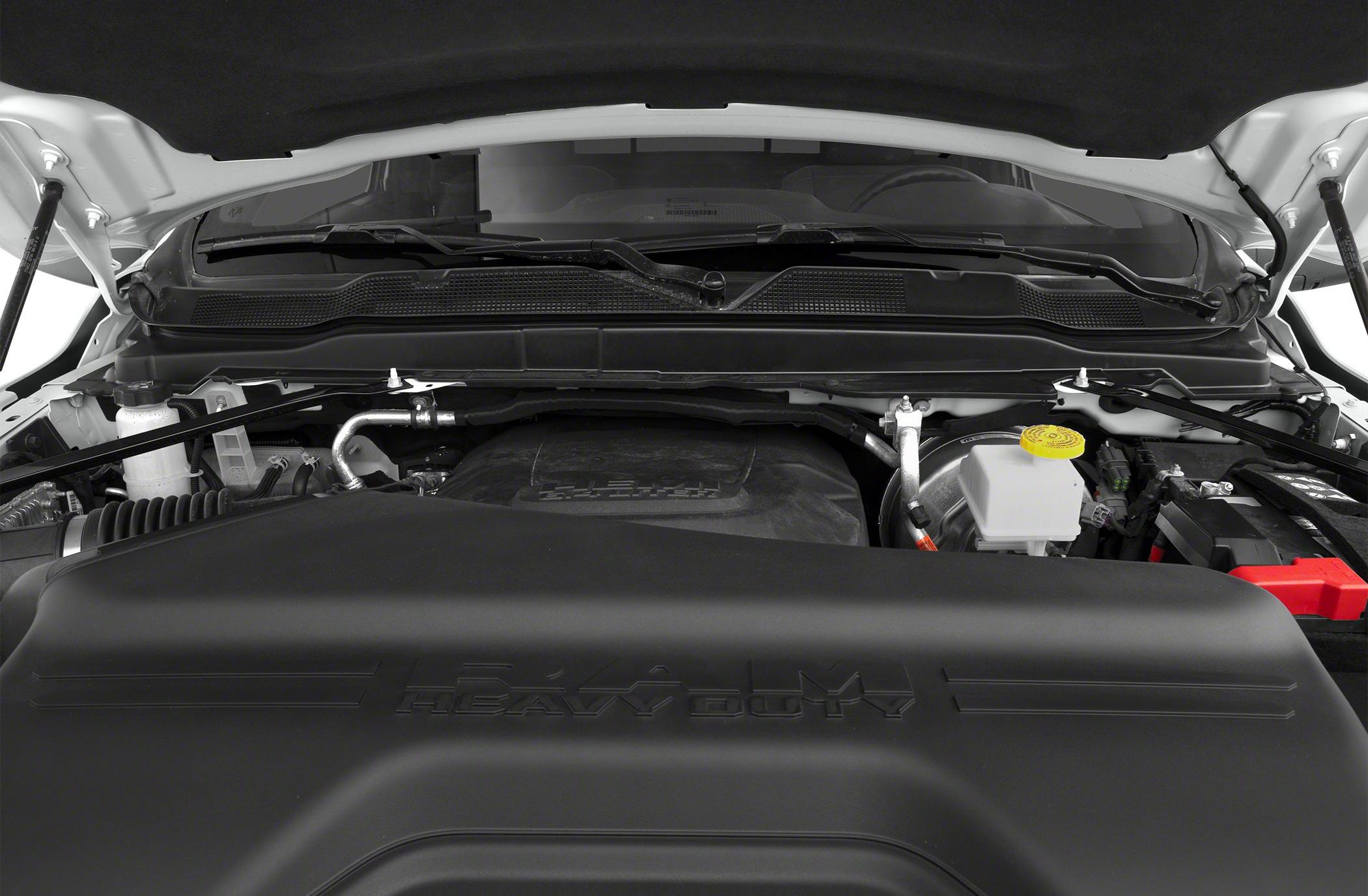 Close-up of heavy-duty engine compartment with cover labeled RAM Heavy Duty