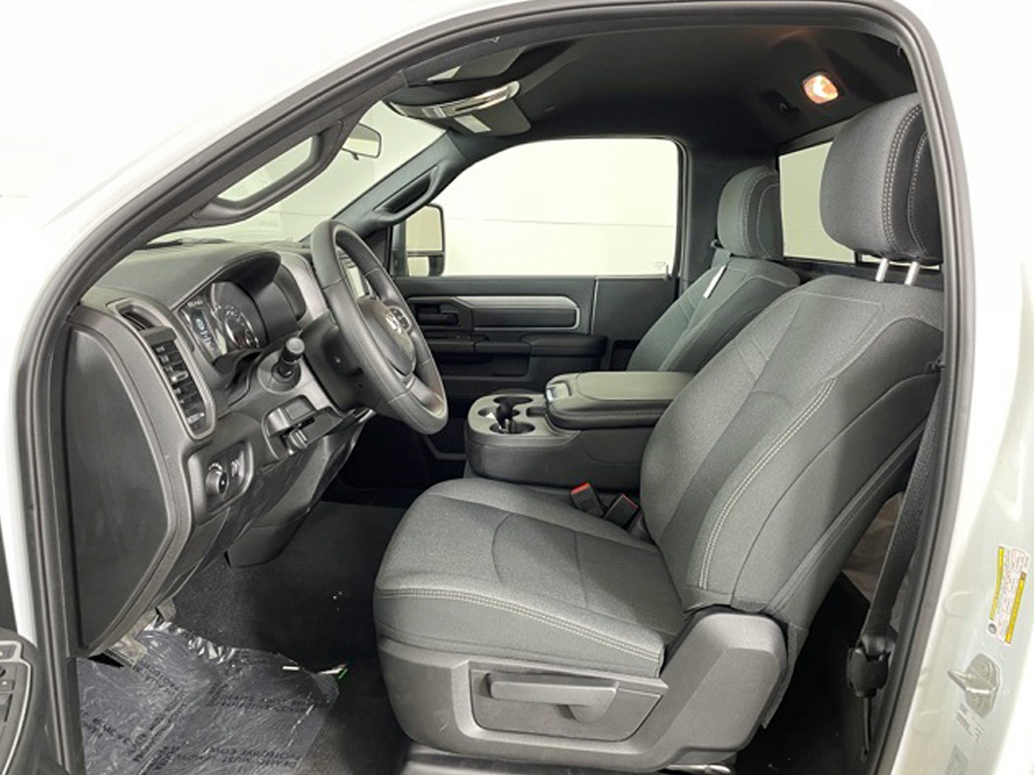 Spacious and functional front interior with durable seating and central console