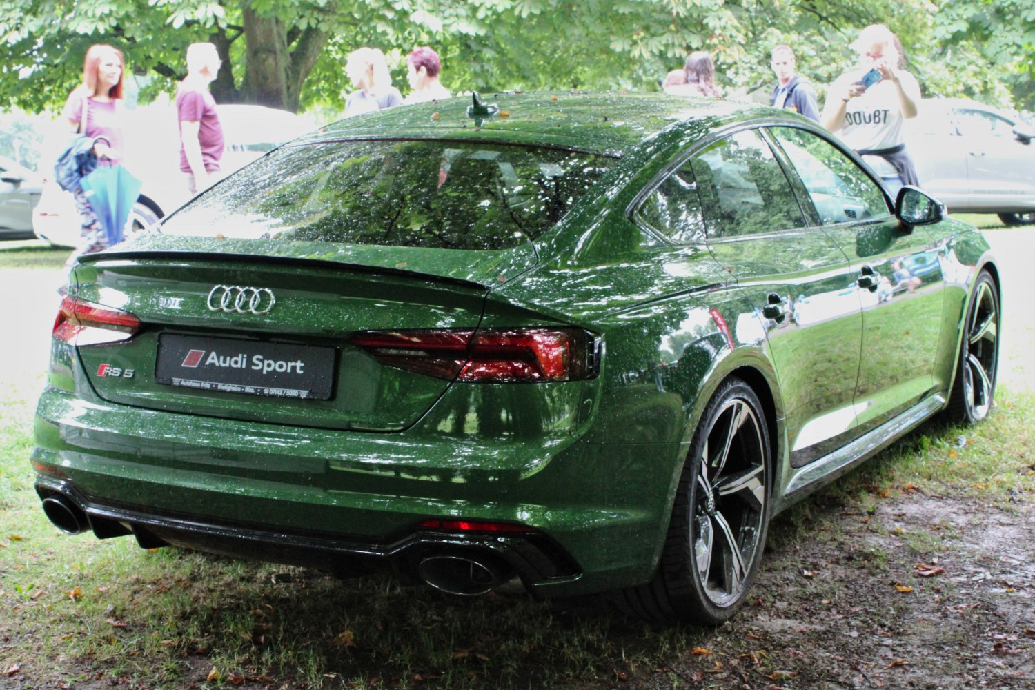 Rear and side profile with taillights and dual exhaust