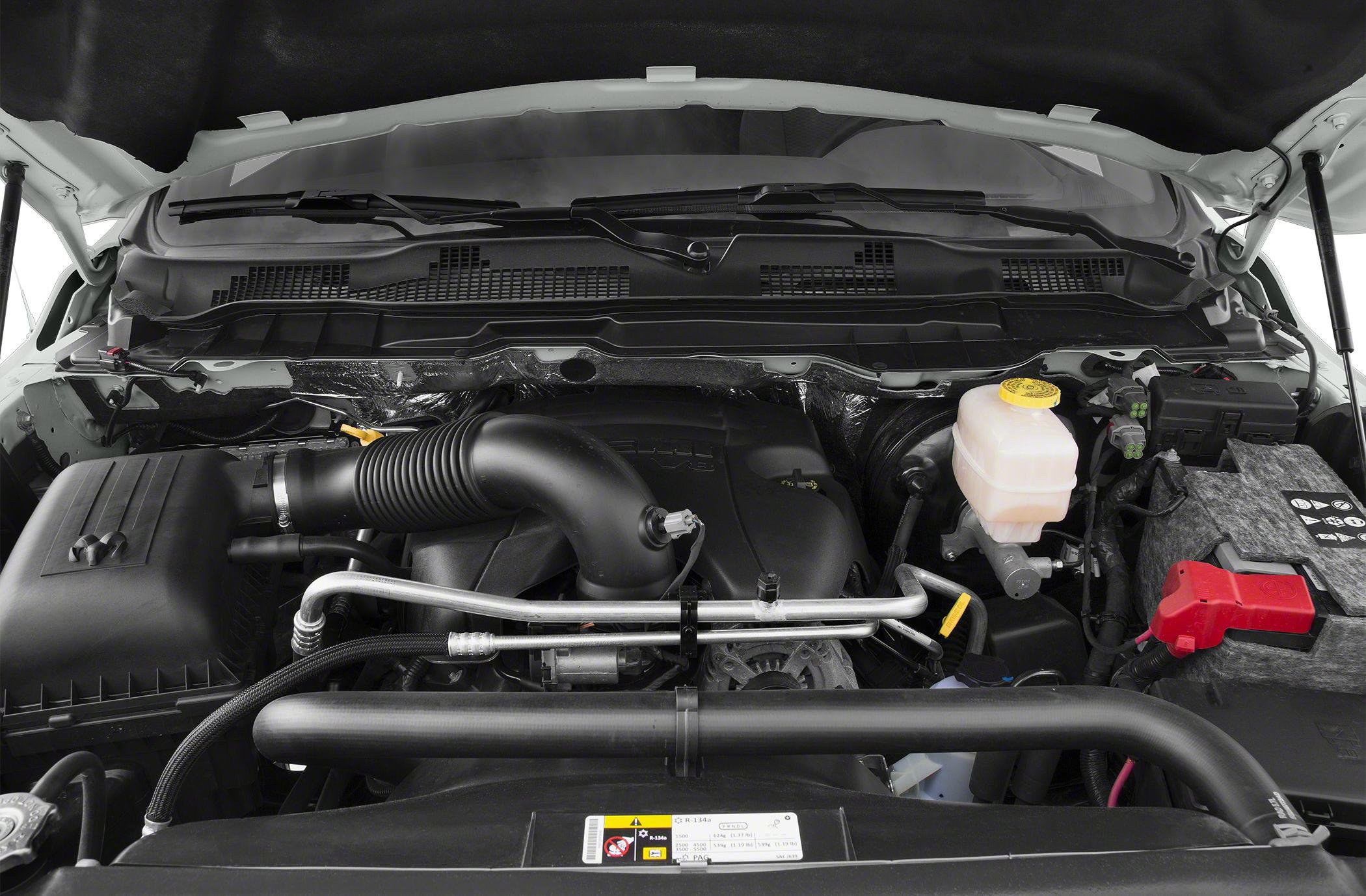 Engine compartment with intake and brake fluid reservoir