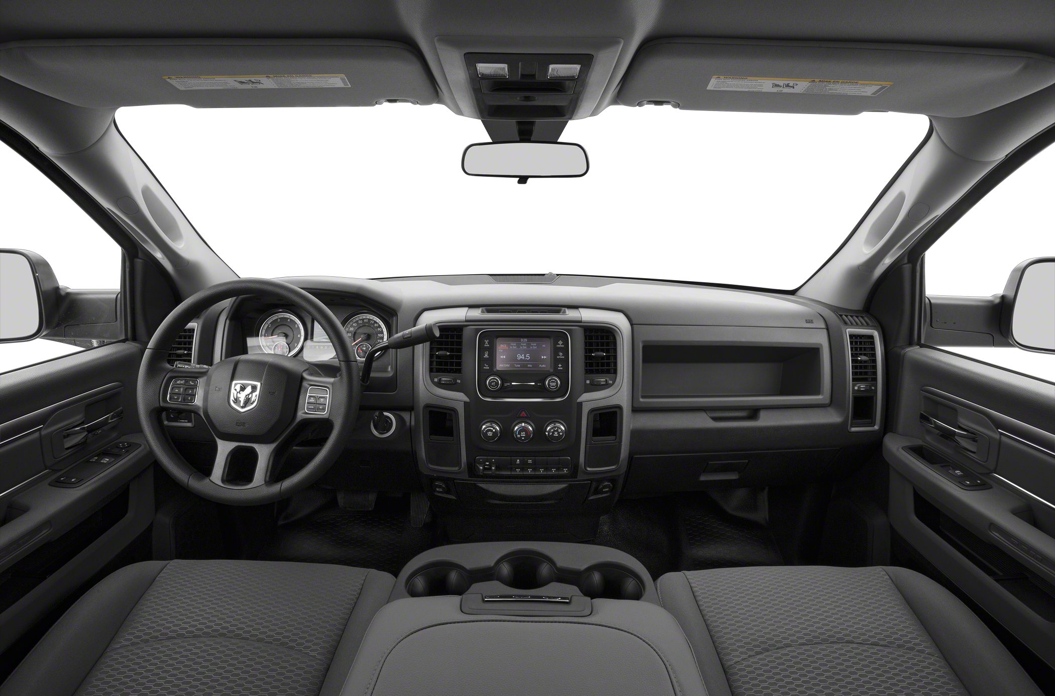 Dashboard and steering wheel with control buttons and central infotainment screen