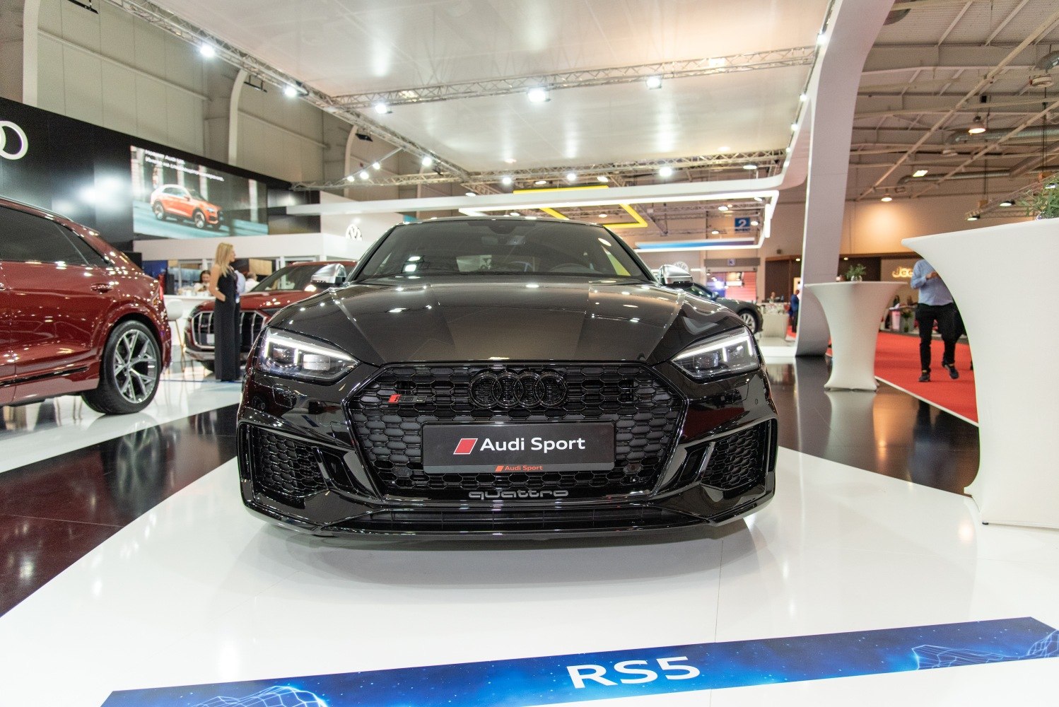 Front view with LED headlights and honeycomb grille