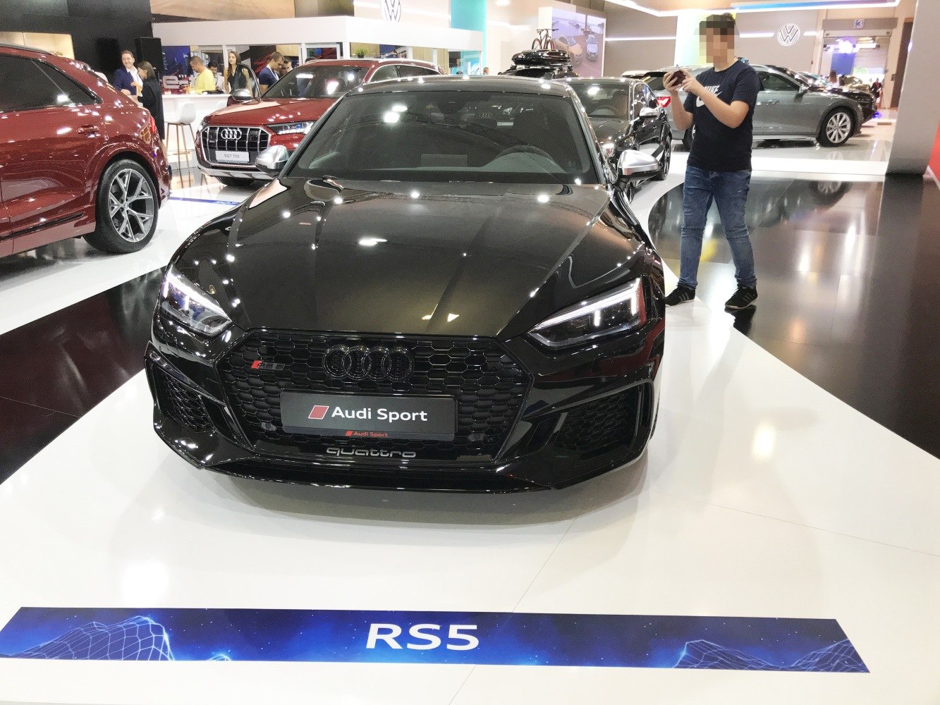 Front view with aggressive grille and LED headlights