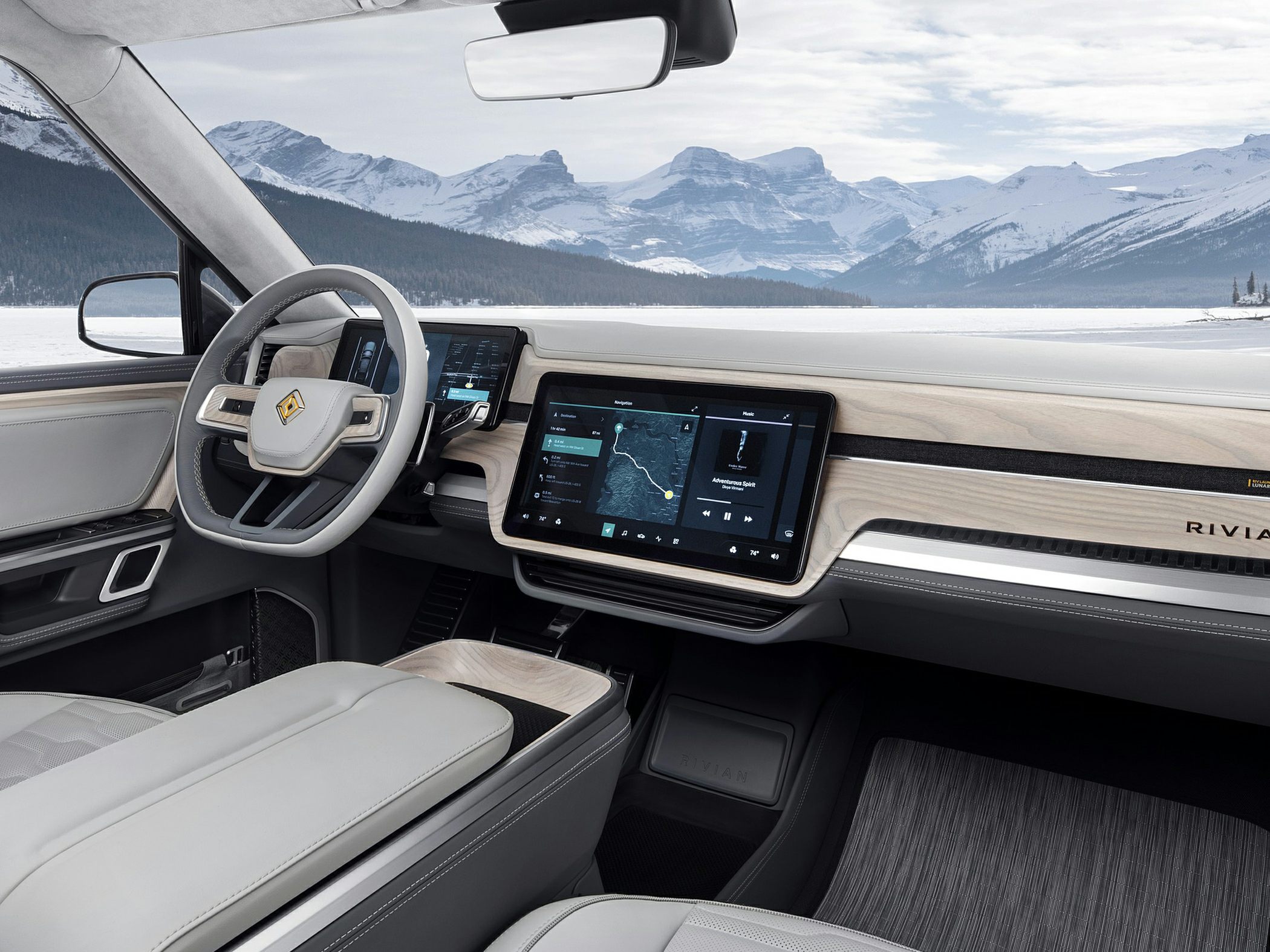 Modern SUV interior with dual digital screens and wood trim dashboard