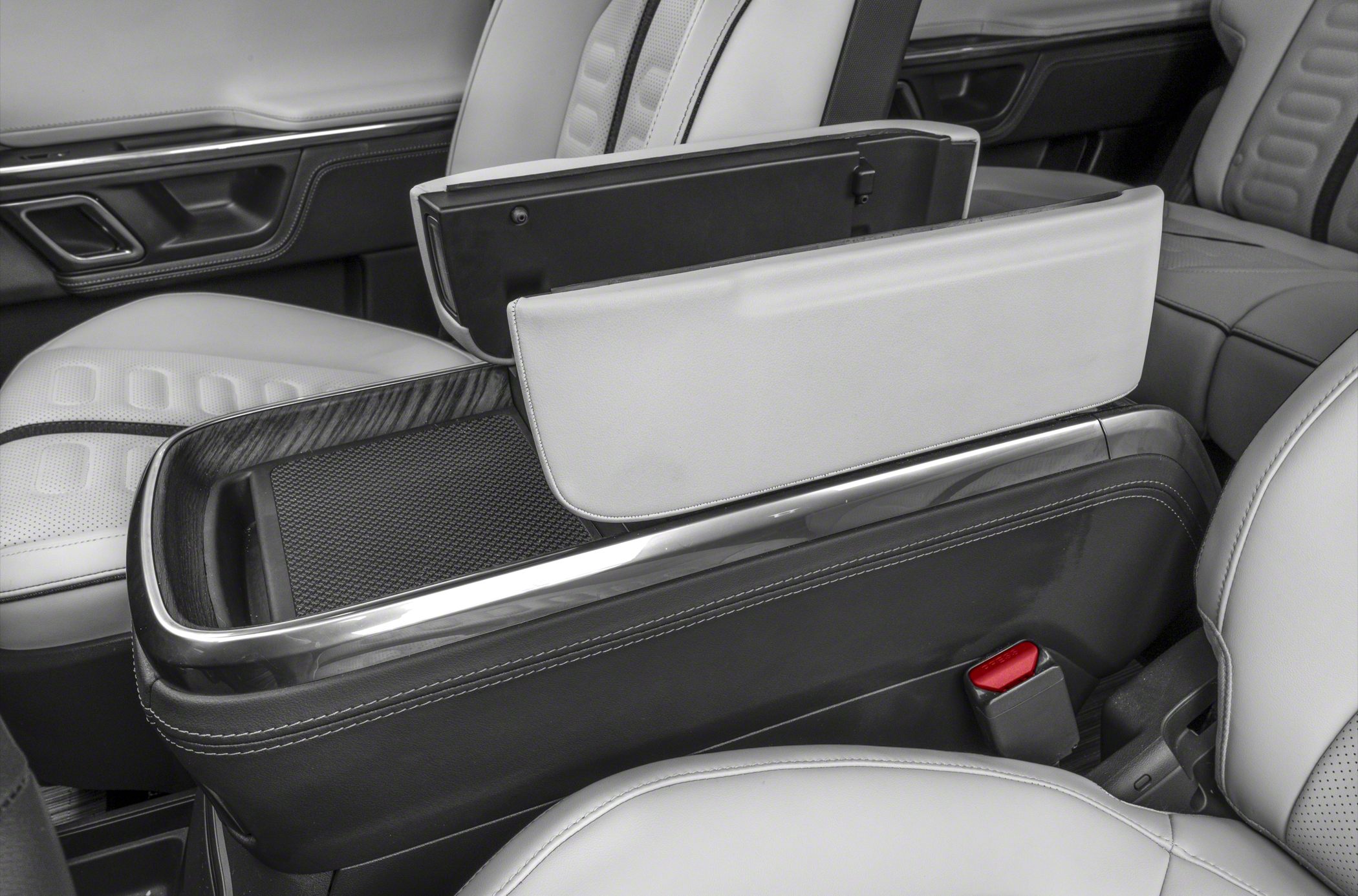 Center console storage compartment with armrest and leather seats